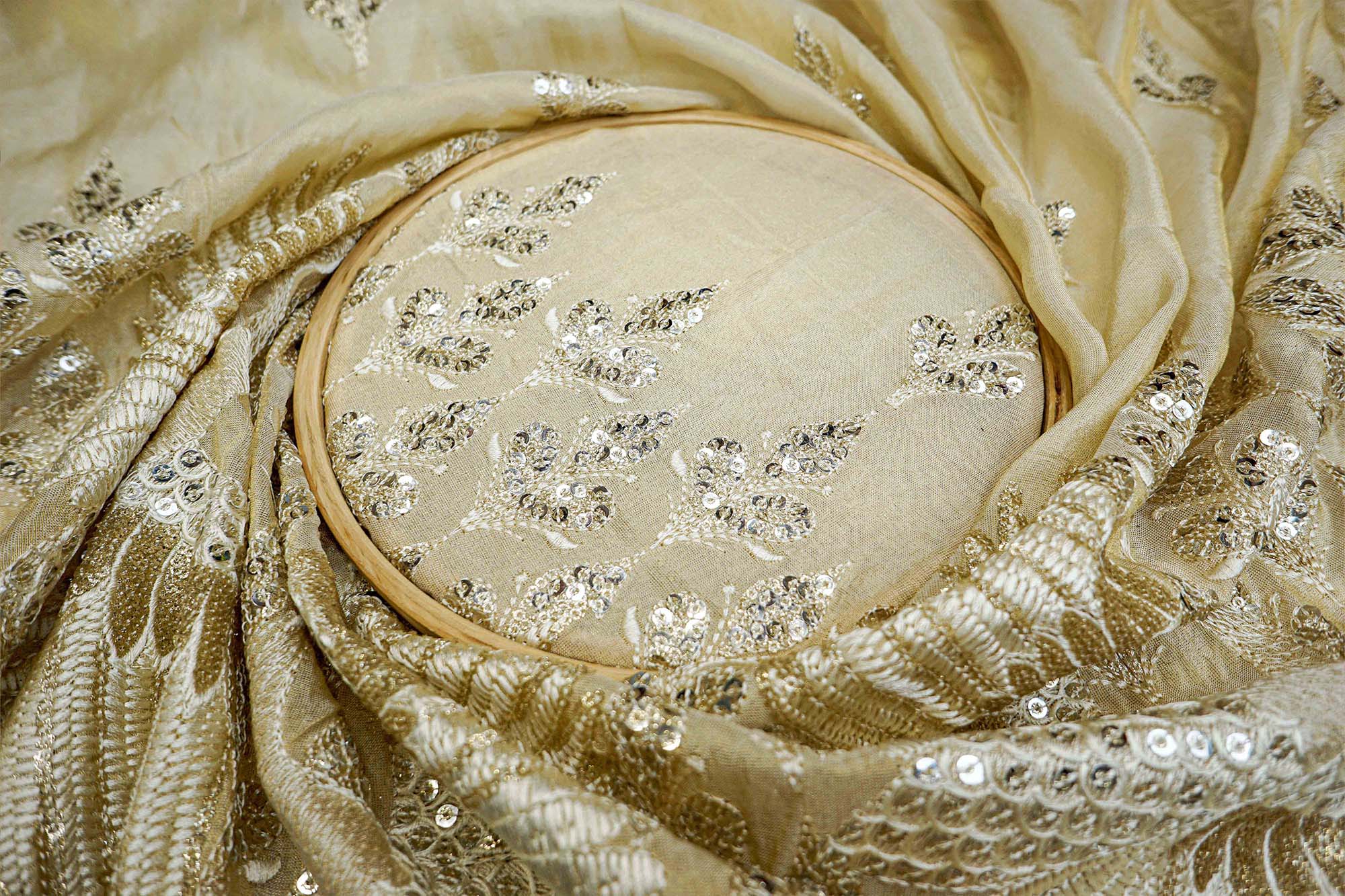 Golden Tissue Fabric With Sequins , Zari And Threadwork Elegance