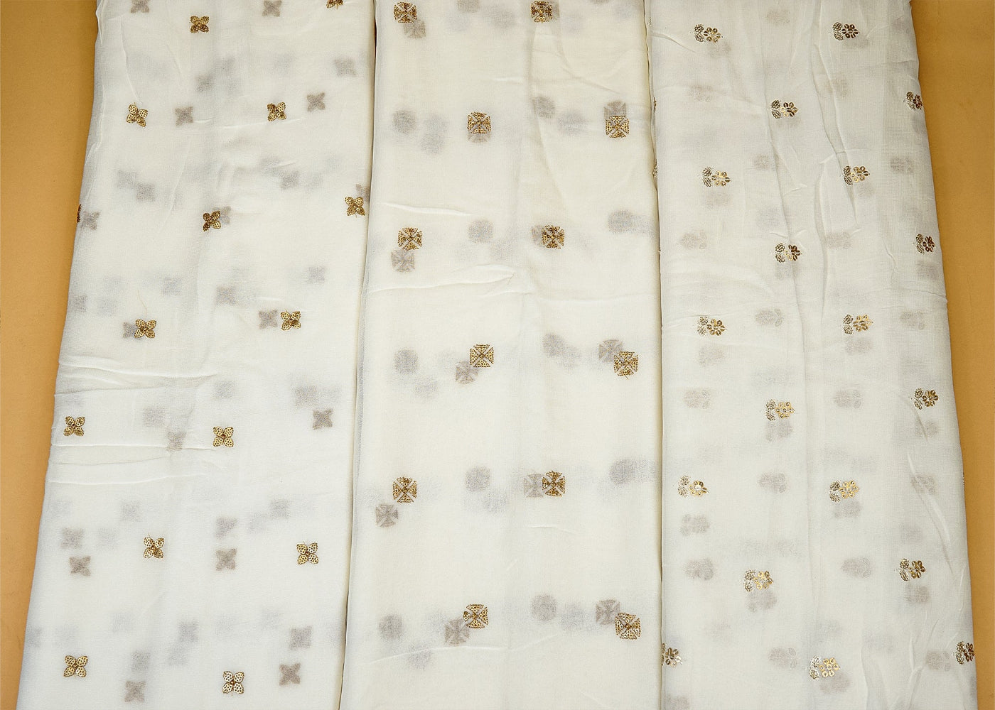 Dyeable Abstract Georgette With Allover Zari Butti Work