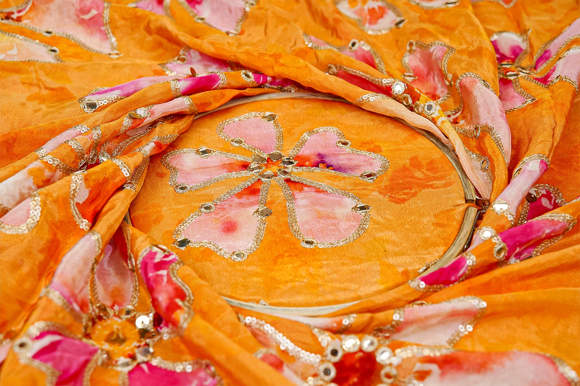 Mustard floral crepe fabric with zari, faux mirror, and sequin embellishments for elegant designs - Paras Gallery Fabrics