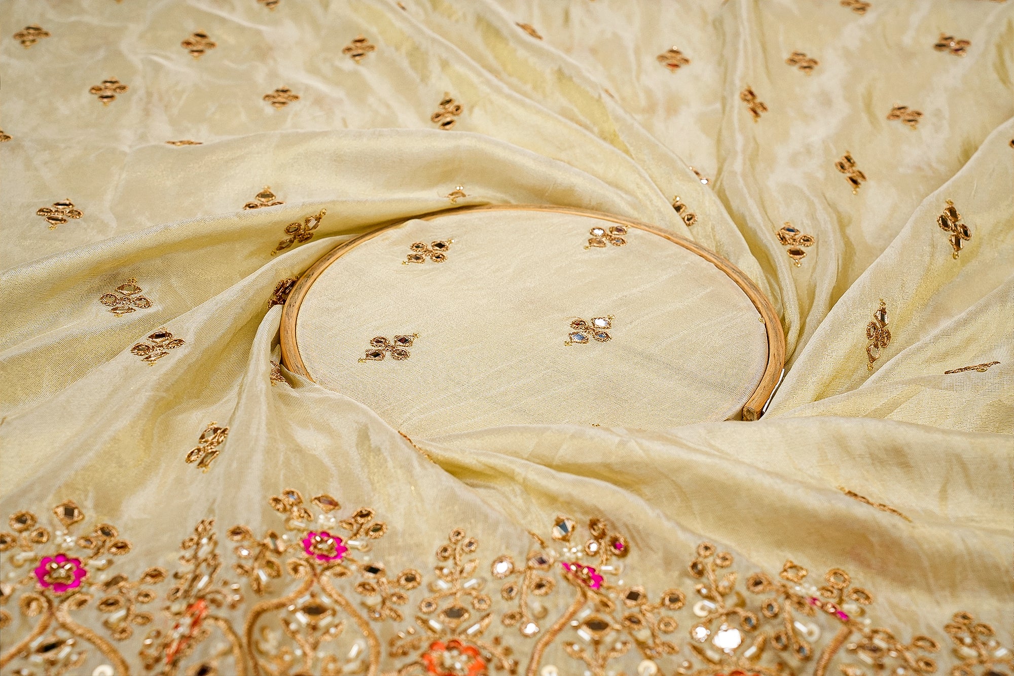 Golden Bloom Tissue Fabric with Pink-Orange Embroidery and Pearl Elegance