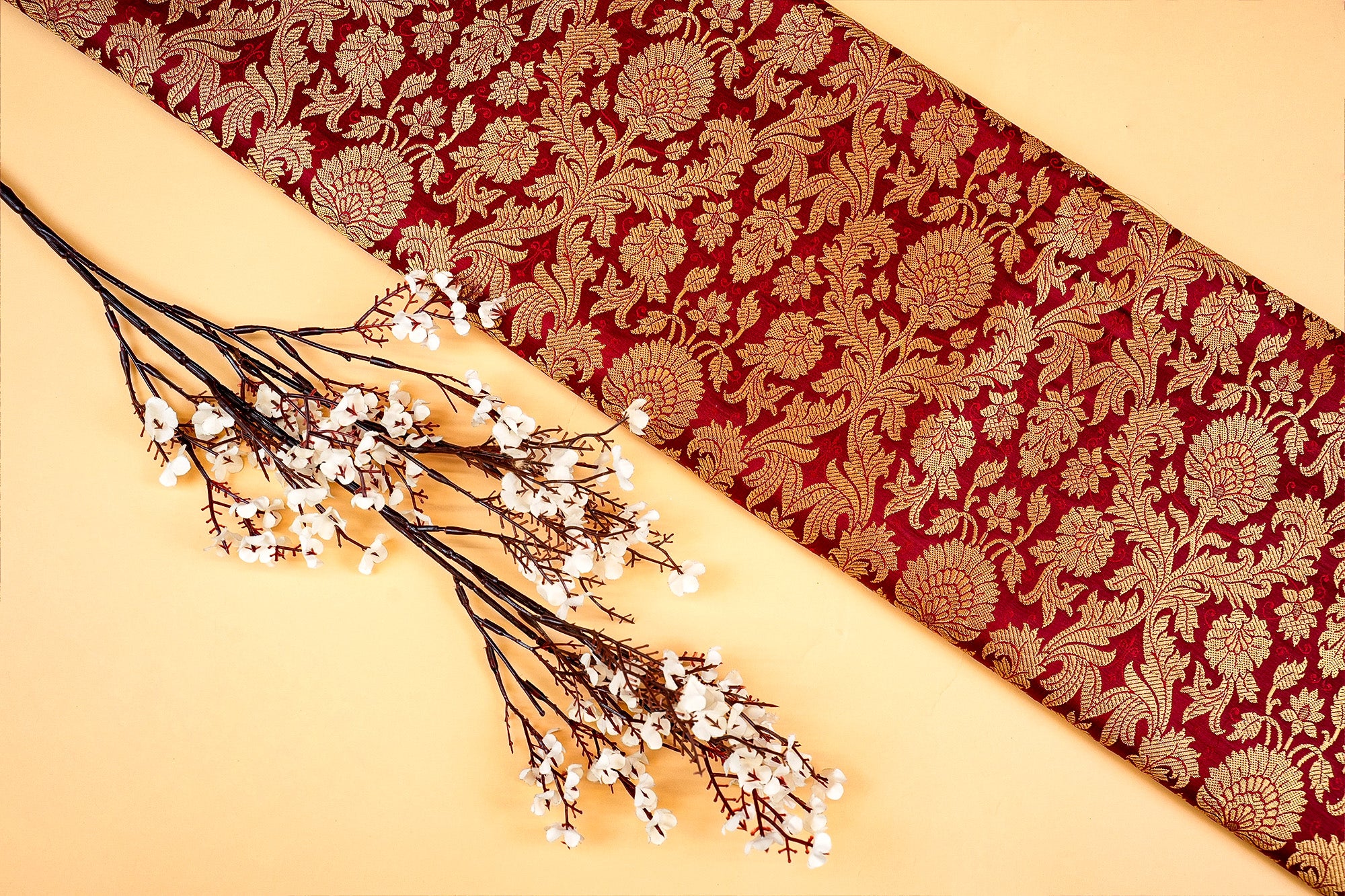 Maroon Banarasi Brocade with Beautiful Golden Traditional Print- Paras Gallery Fabric