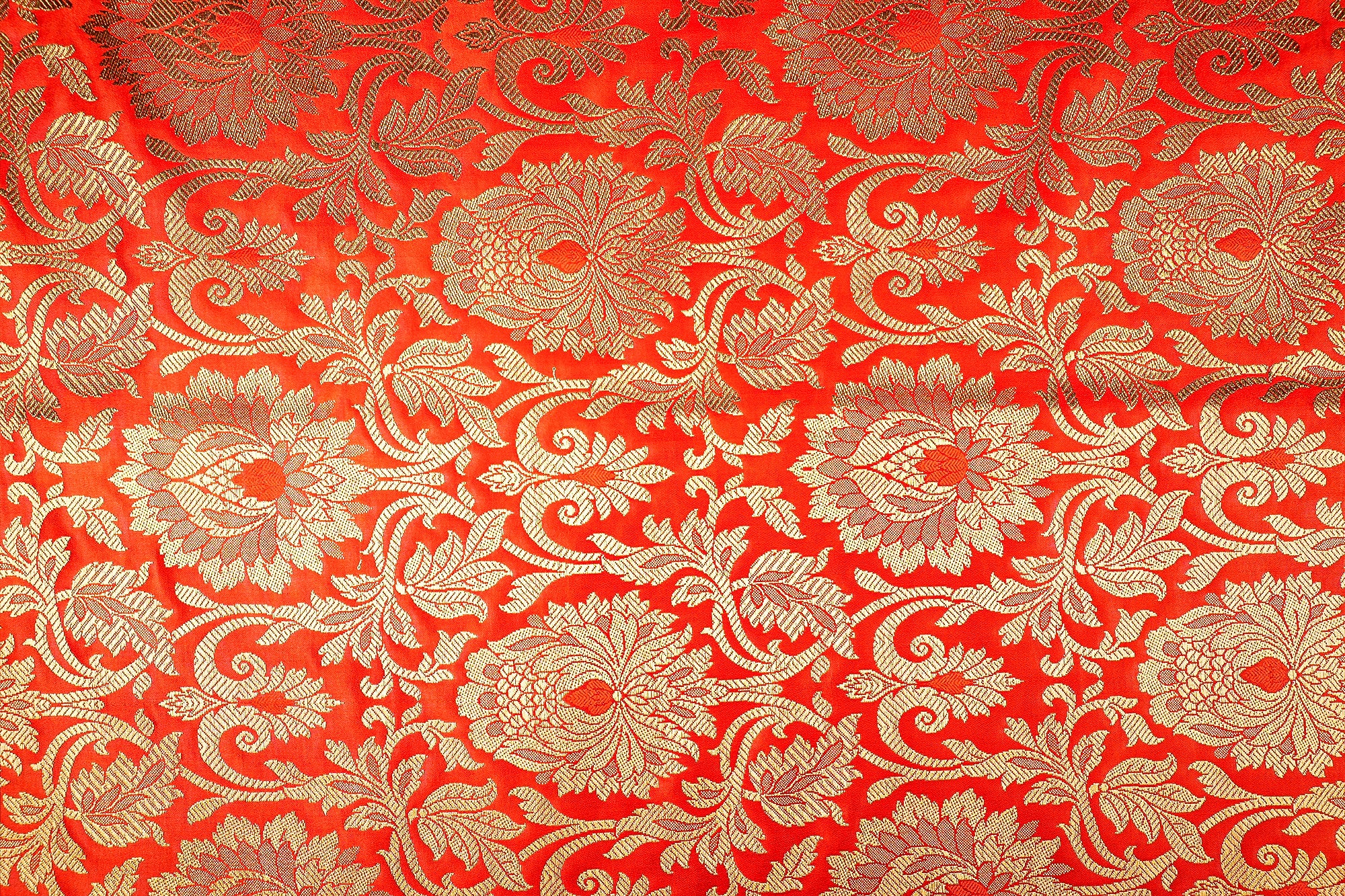 Golden traditional print on orange Banarasi brocade fabric- Paras Gallery Fabrics