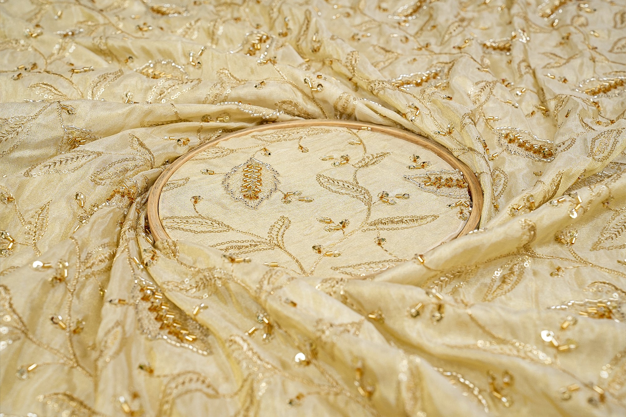 Golden Radiance Tissue Fabric with Kutdana, Sequins, Zari, and Beads