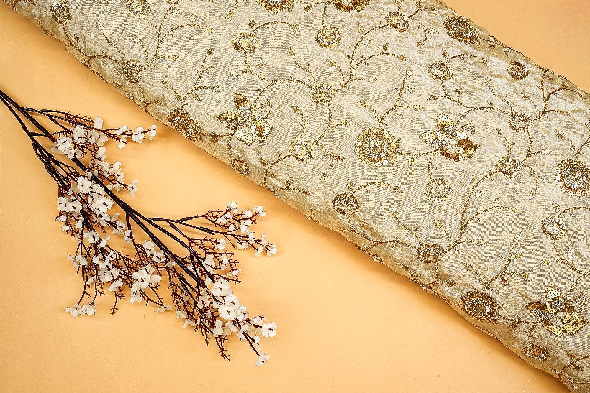 Golden Radiance Tissue Fabric with Kutdana, Sequins, Zari, and Beads - Paras Gallery Fabrics