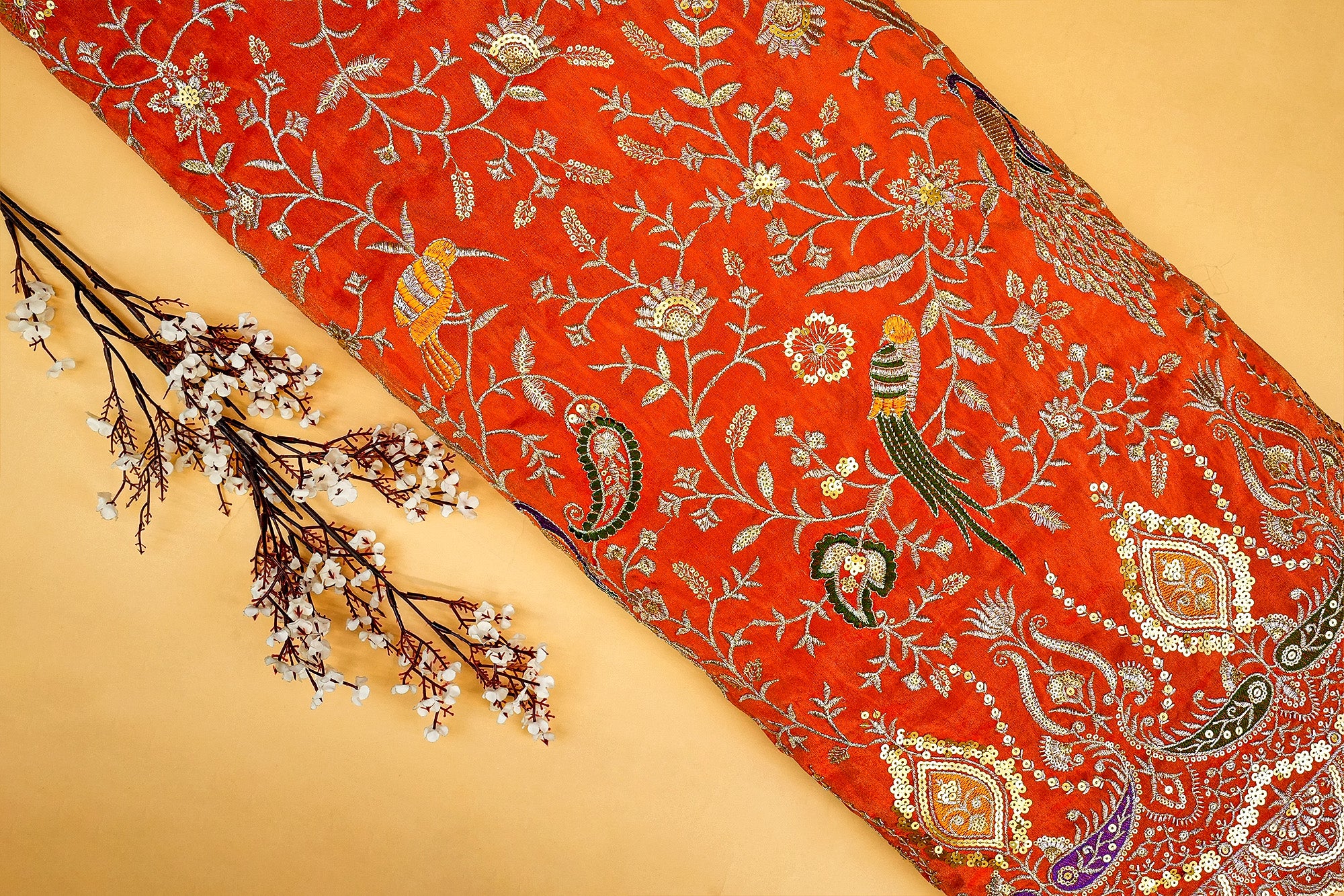 Orange Glow Tissue Fabric with All-Over Zari, Sequins, and Multicolor Threadwork Embellishments