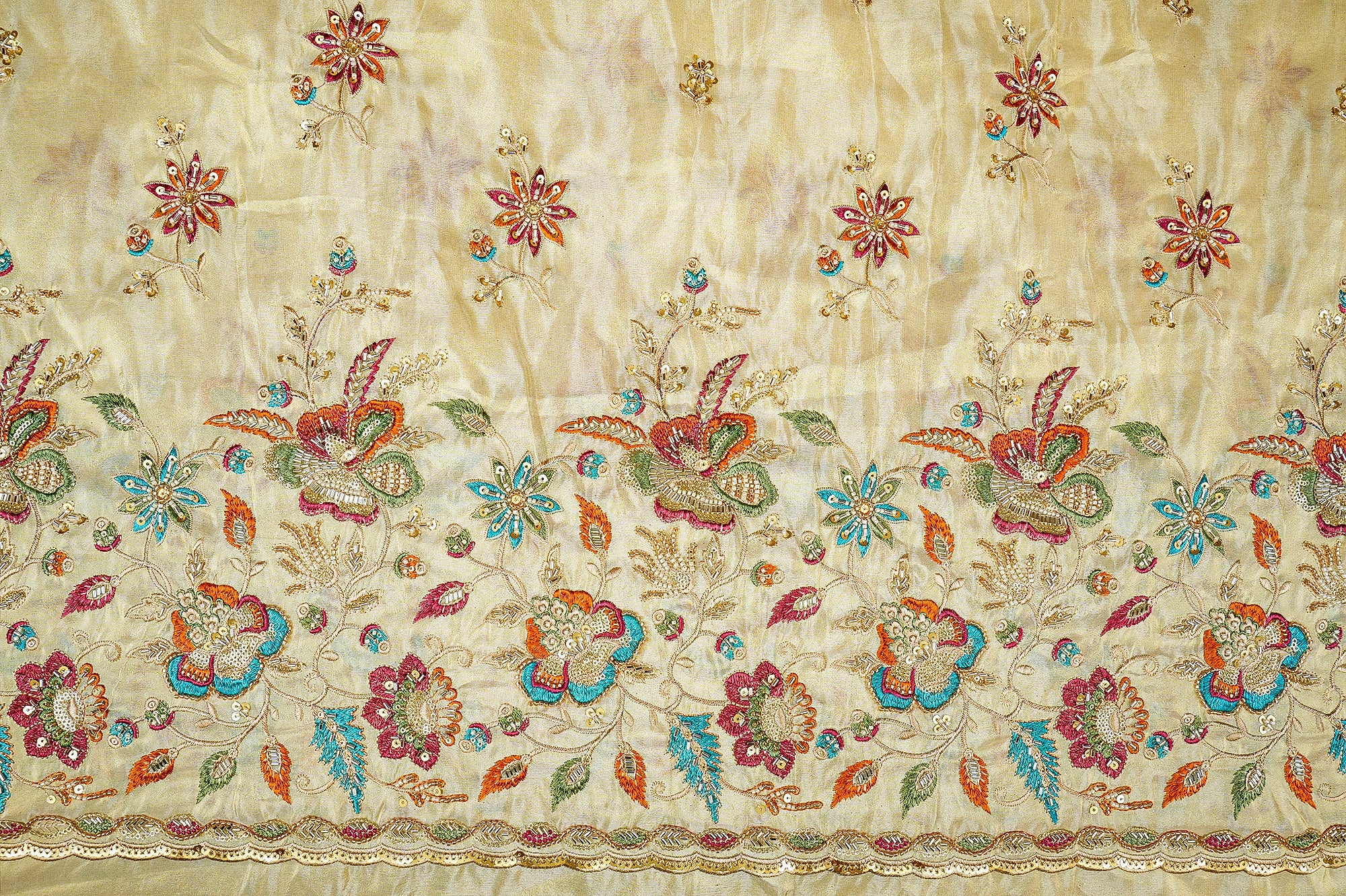 Golden Tissue Fabric with Heavy Floral Border of Sequins, Beads, Kutdana, and Threadwork