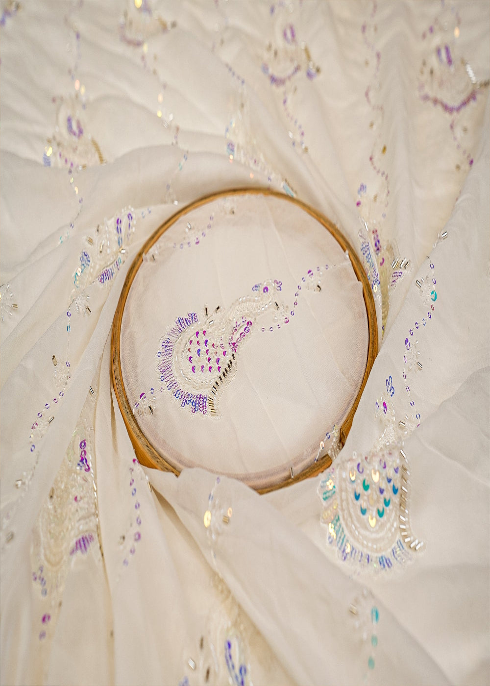 The-Noor---White-Georgette-Peacock-Symphony-Fabric-with-Rainbow-Sequins,-Kutdana,-Beads,-and-Threadwork-|--11670-close-view