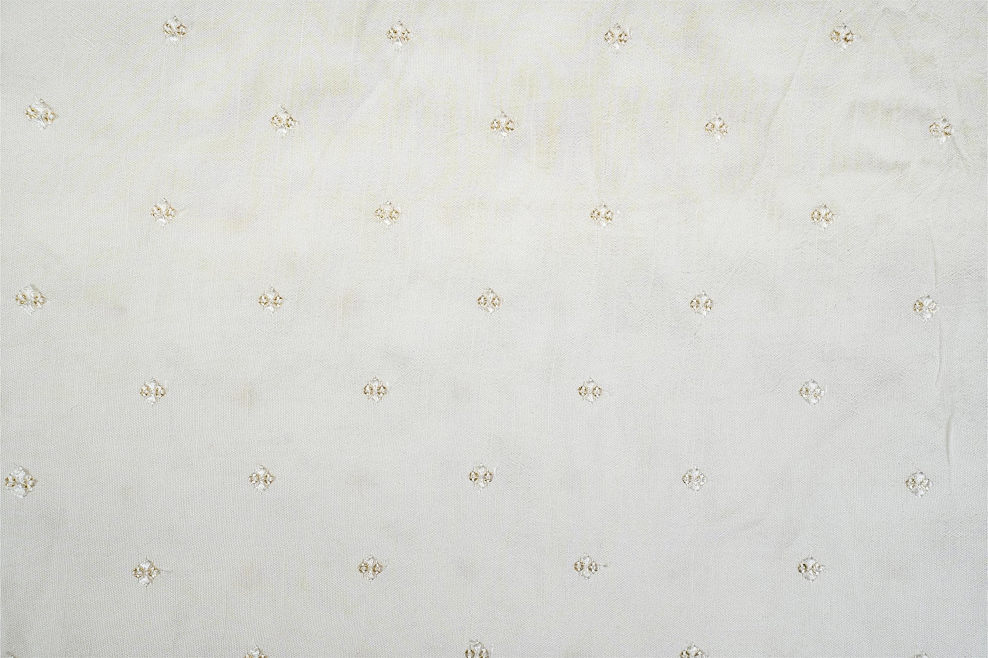 Golden Elegance Dola Silk Fabric with All-Over Butti of White Thread and Sequins