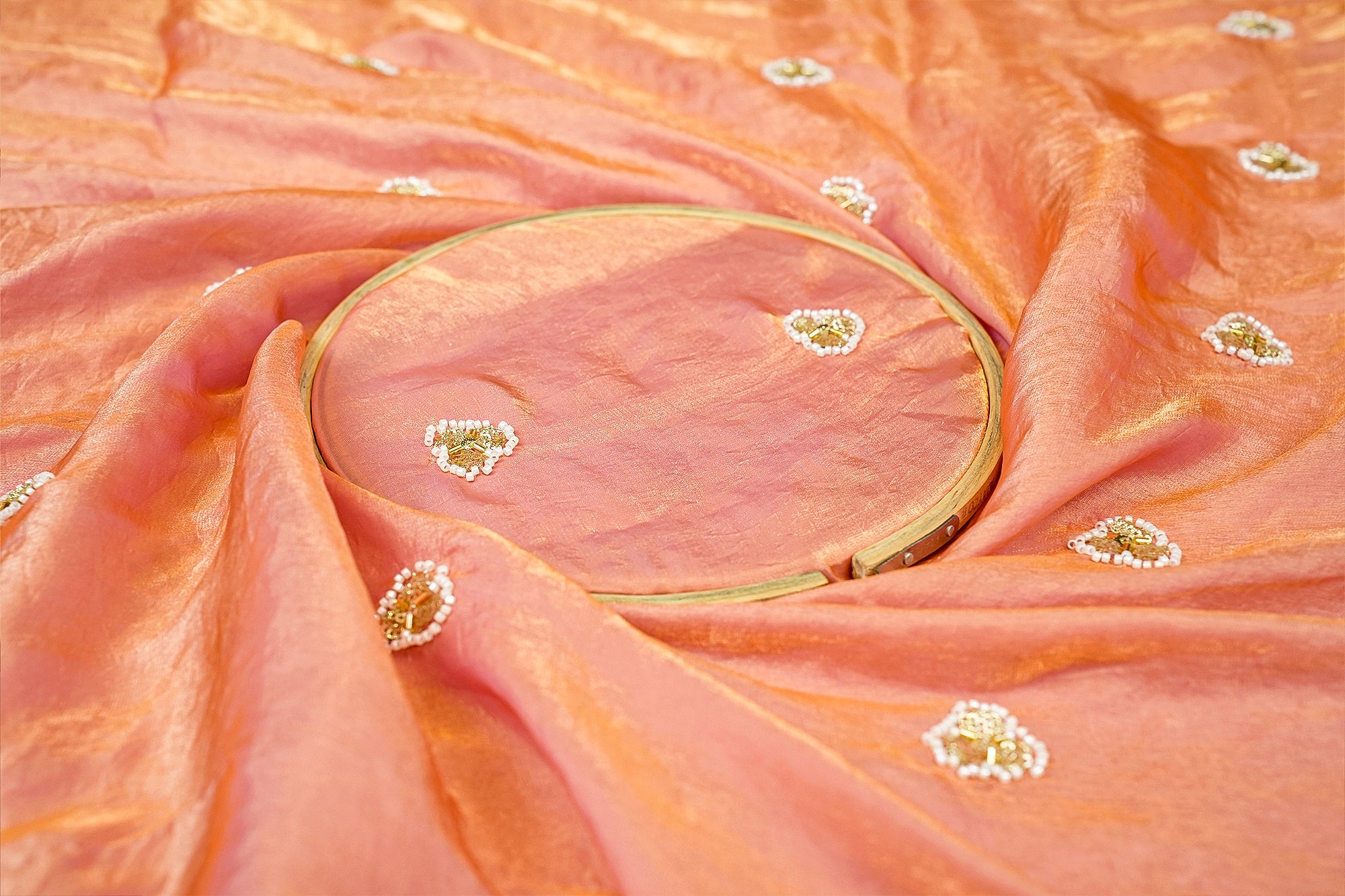 Peach Diamond Radiance Tissue Fabric with All-Over Butti of Golden Sequins, Beads, and Kutdana