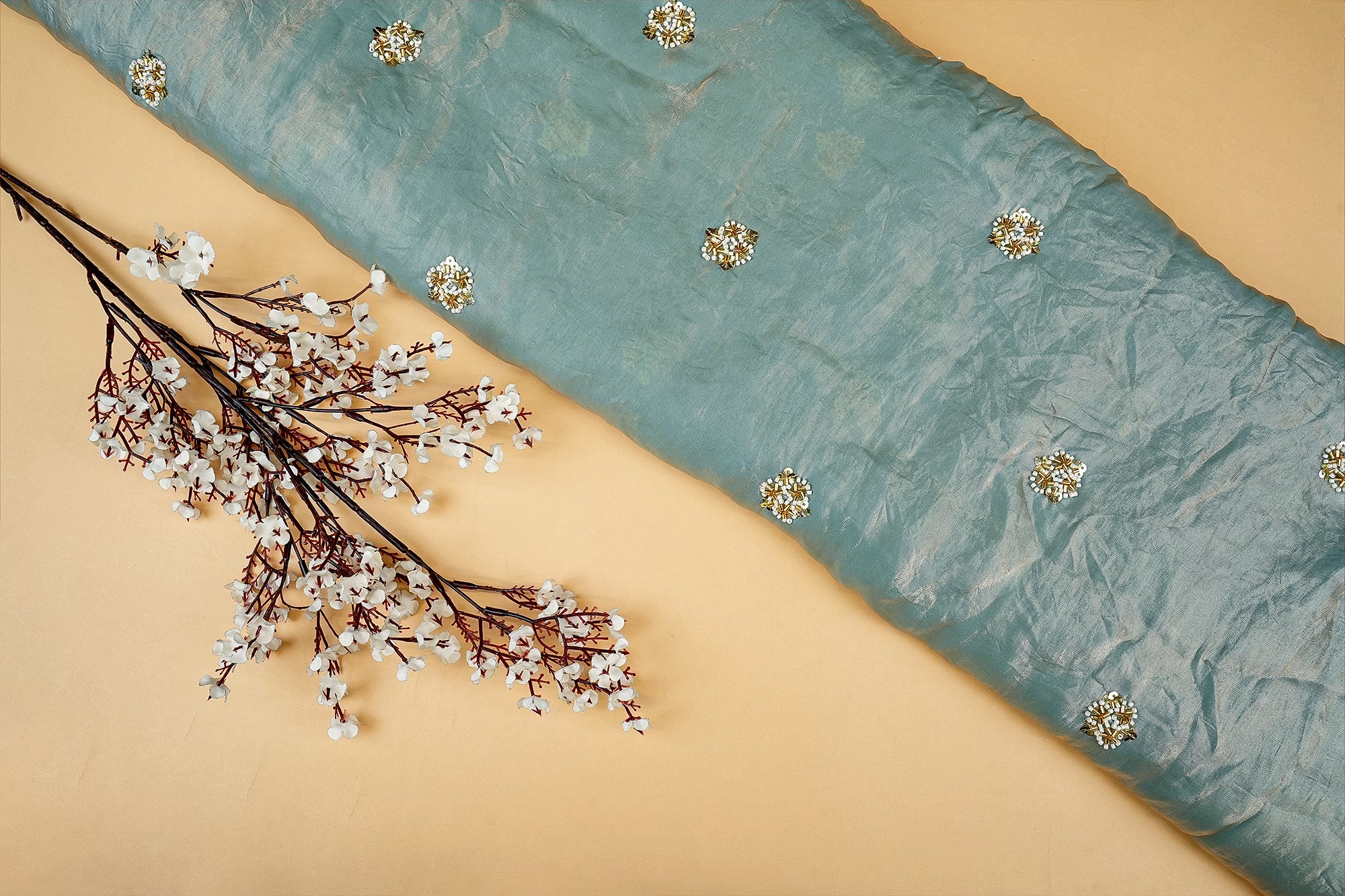 Powder Blue Diamond Radiance Tissue Fabric with All-Over Butti of Golden Sequins, Beads, and Kutdana