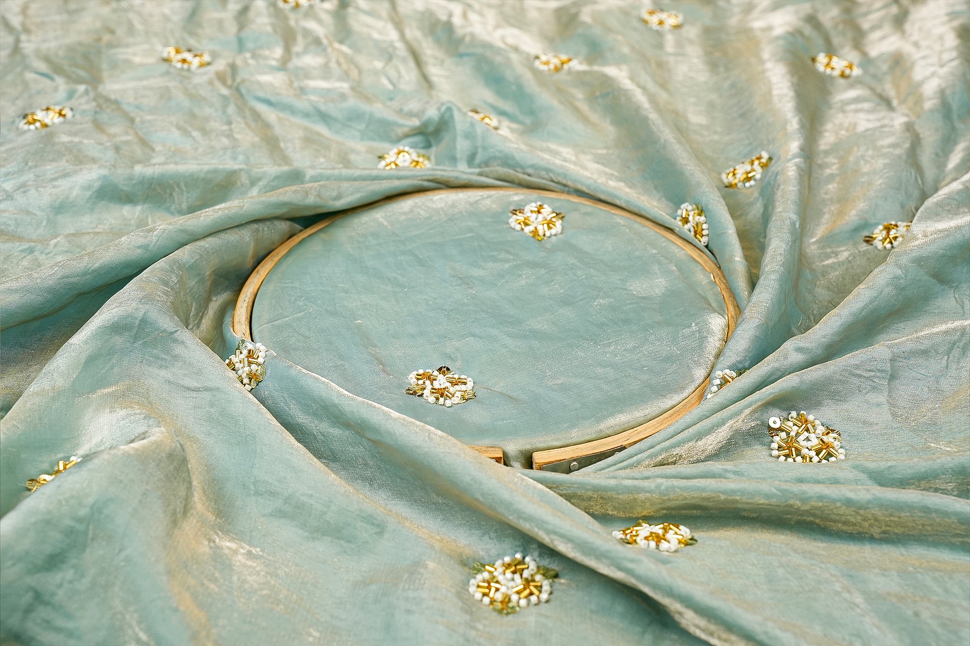 Powder Blue Diamond Radiance Tissue Fabric with All-Over Butti of Golden Sequins, Beads, and Kutdana