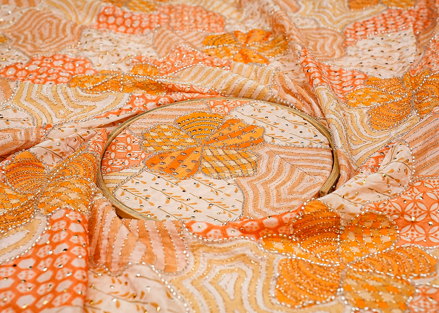 Orange Abstract Opulence Crepe Fabric with Mukesh, Zari, and Kutdana Work