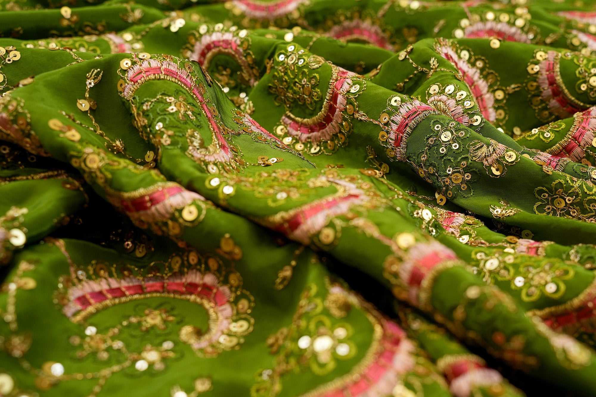 Elegant olive crepe featuring multicolor thread work, golden sequins, and floral zari embroidery - Paras Gallery Fabrics