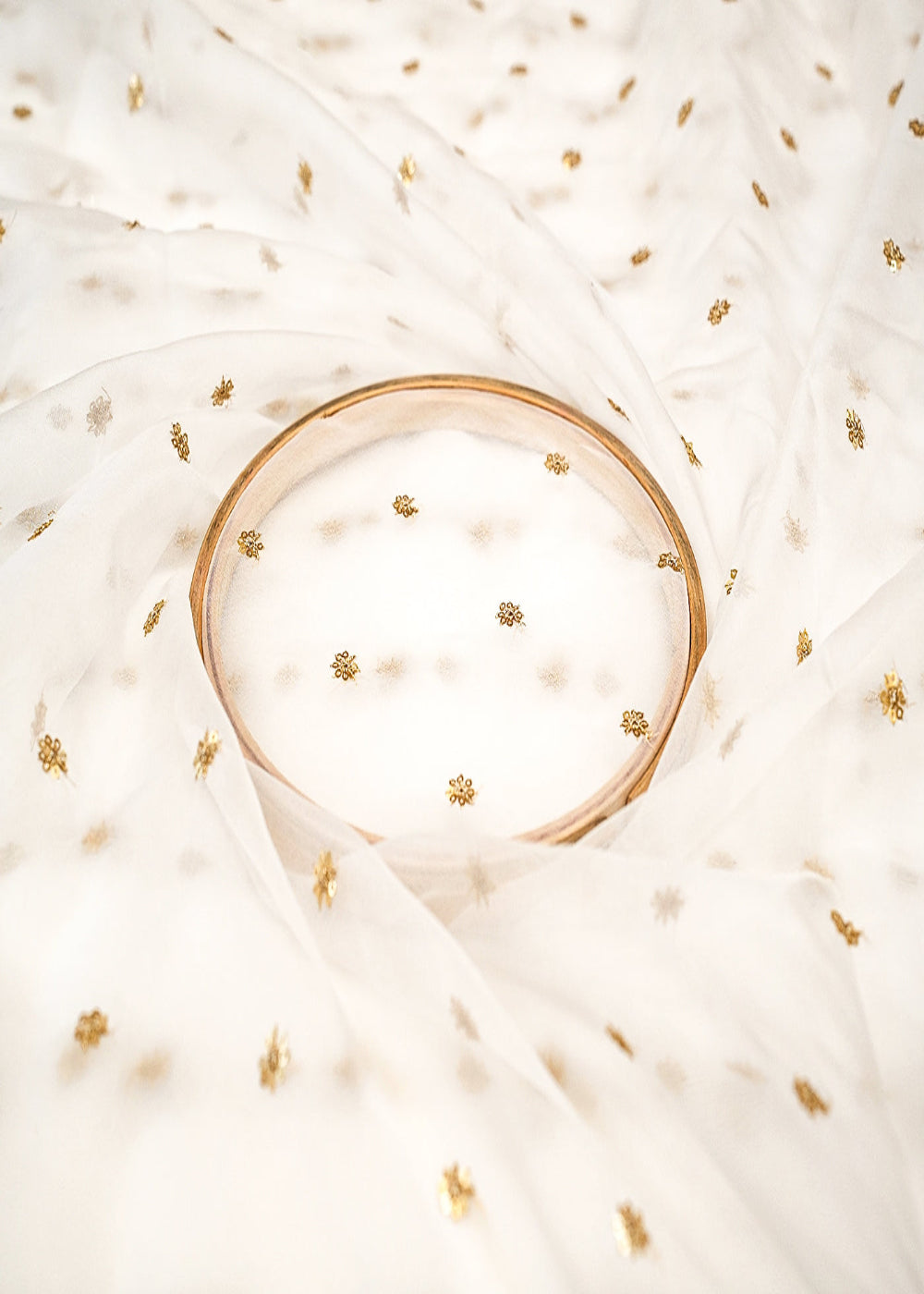 The-Noor-White-Organza-Fabric-with-Golden-Buti-of-Sequins-12297-close-view