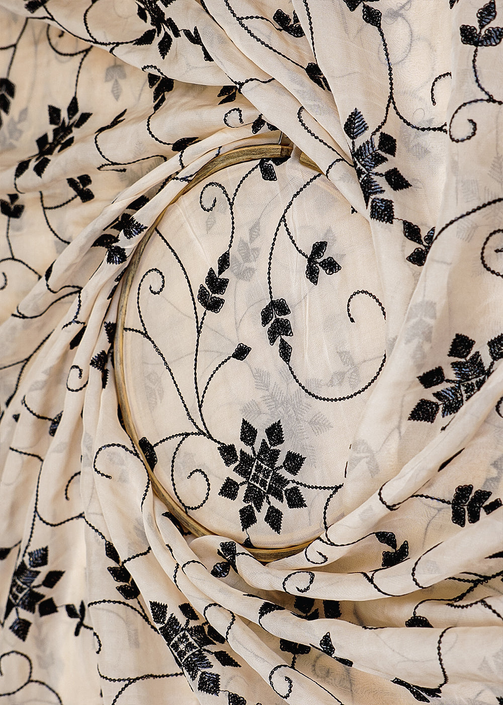 Light-Peach-Organza-Fabric-with-Allover-Black-Thread-and-Sequins-Work-13638-close-view