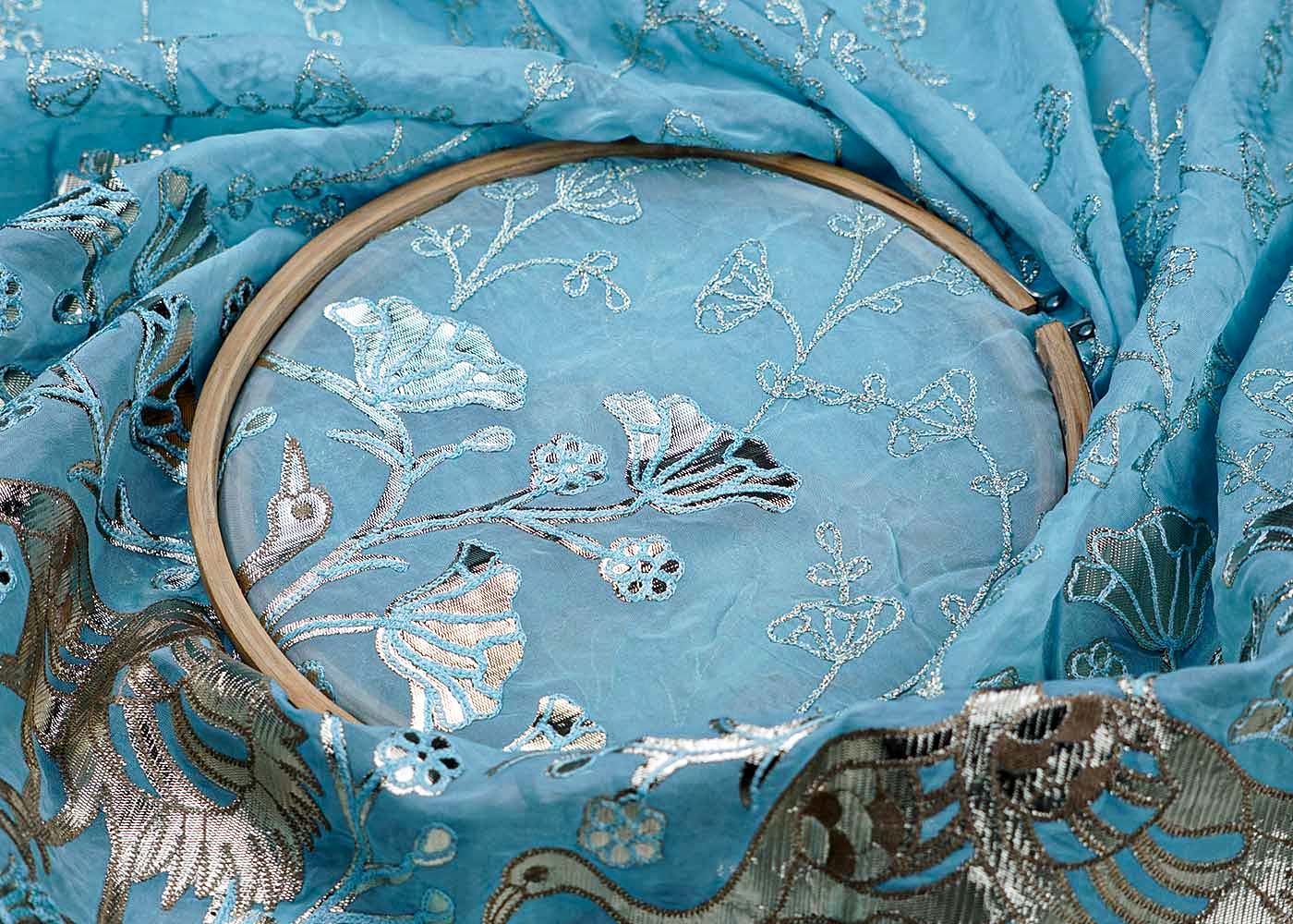 Sky Blue Organza Fabric With All Over Zari And Gota Pati Work With One Side Heavy Border 15596