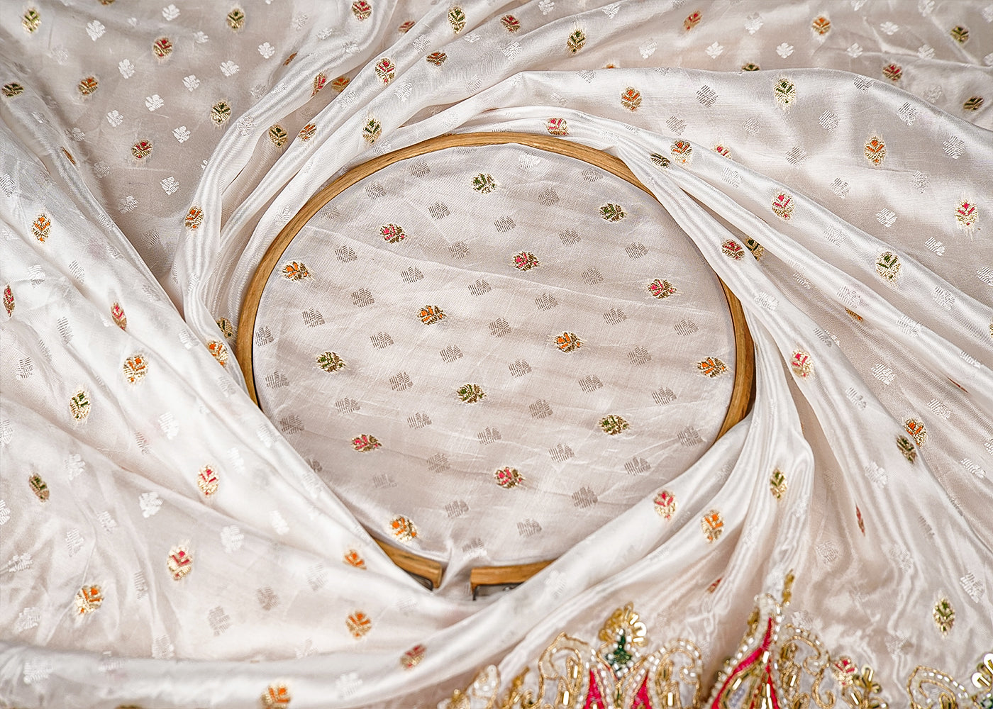 White Silk Fabric With All Over Zari Buti With One Side Zari, Thread and Sequins Work and Scalloped Border 15999