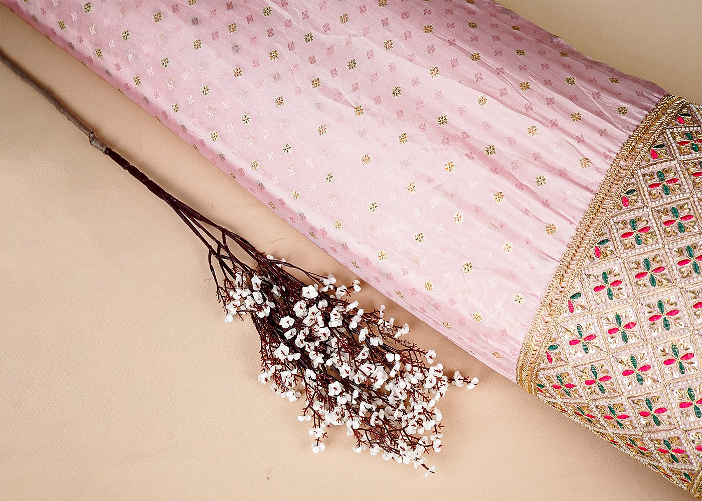 Light Pink Silk Fabric With All Over Zari Buti With One Side Zari, Thread and Sequins Work Border 16000