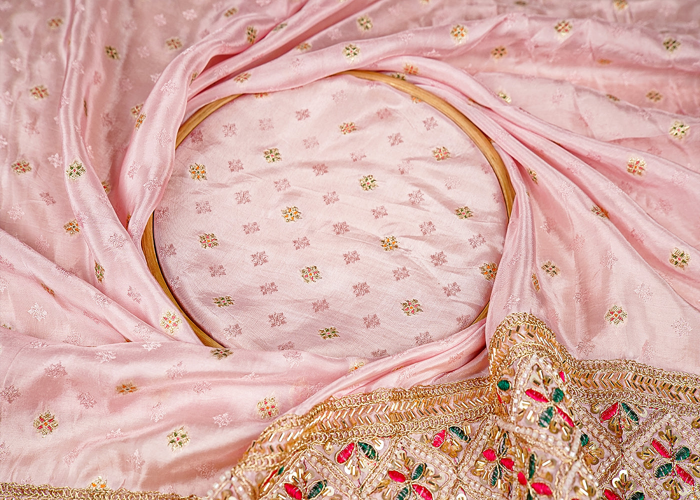 Light Pink Silk Fabric With All Over Zari Buti With One Side Zari, Thread and Sequins Work Border 16000