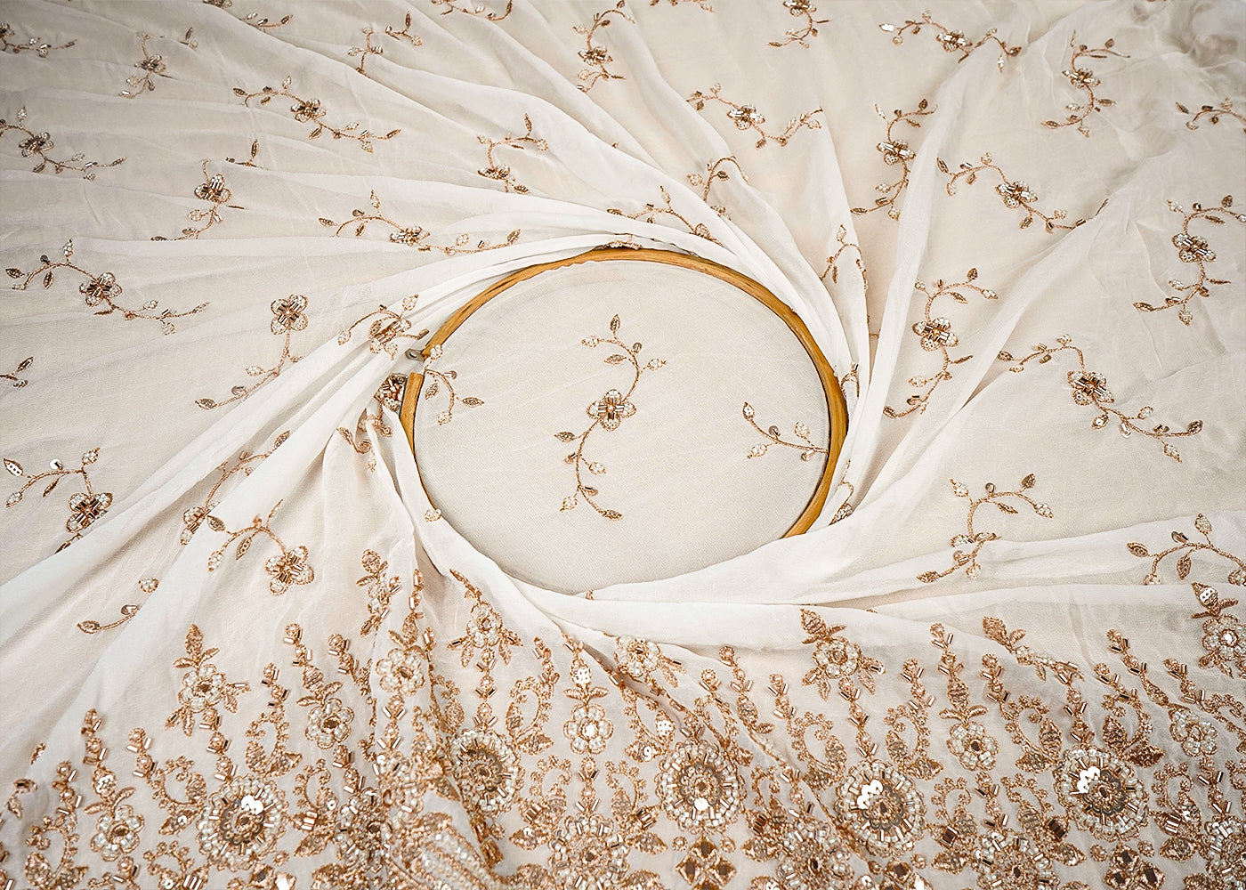 White Georgette Fabric With All Over Bead, Zari, Faux Mirror And Sequins Work With One Side Heavy Border 16012