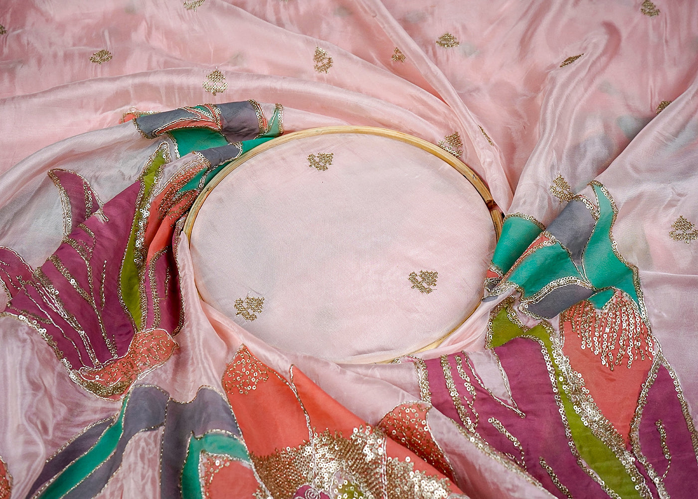Peach Silk Fabric With All Over Zari And Sequins Buti With One Side Heavy Border 16311