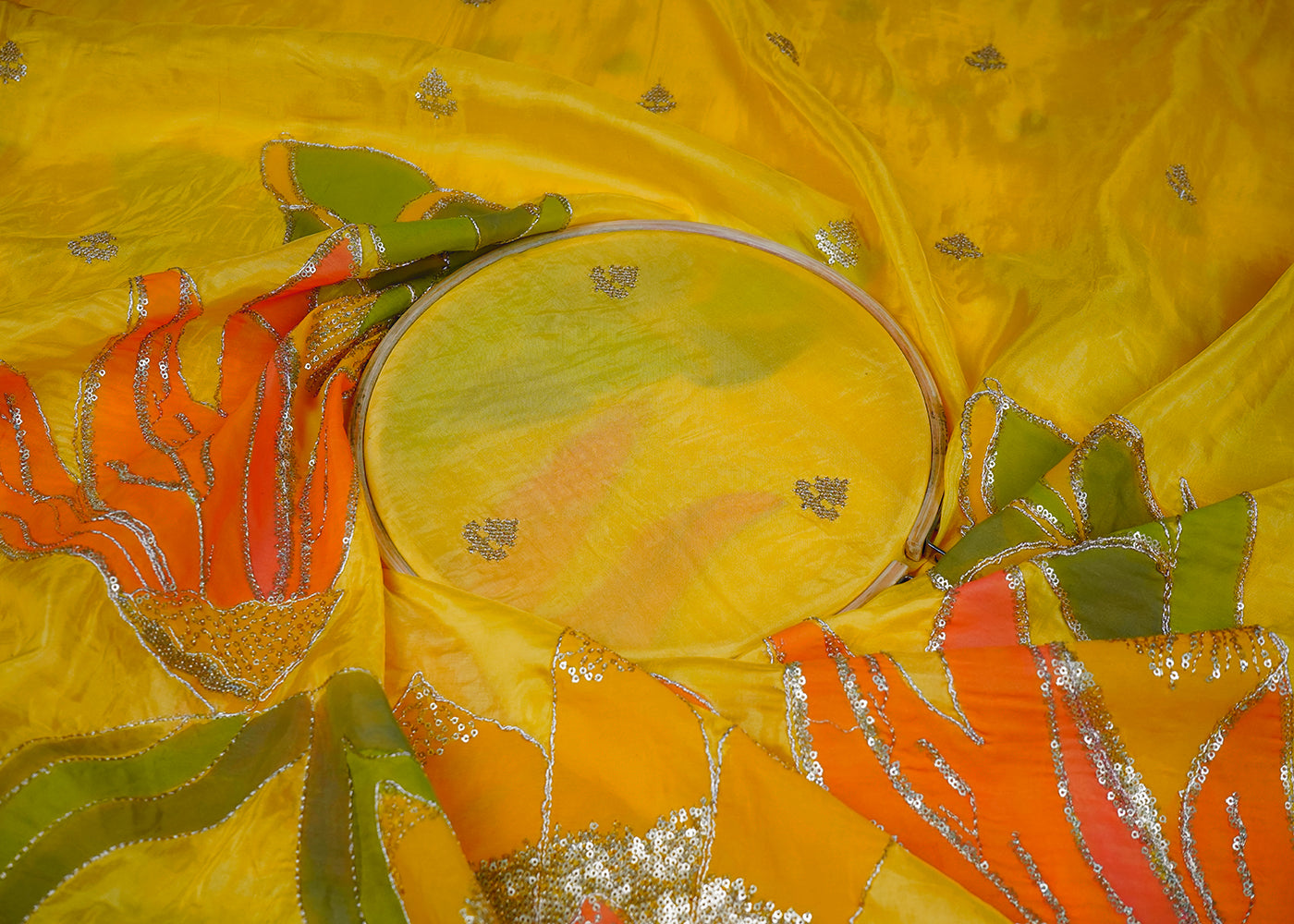 Yellow Silk Fabric With All Over Zari And Sequins Buti With One Side Heavy Border 16312