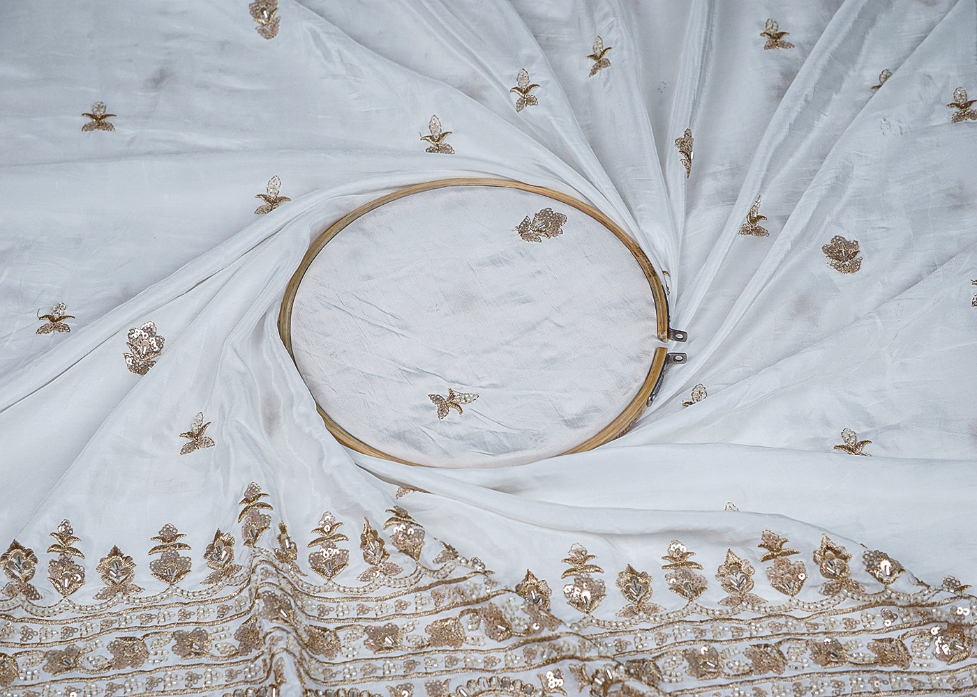 White Crepe Fabric With All Over Buti Of Katdana, Zari, Sequins And One Side Heavy Border 16401
