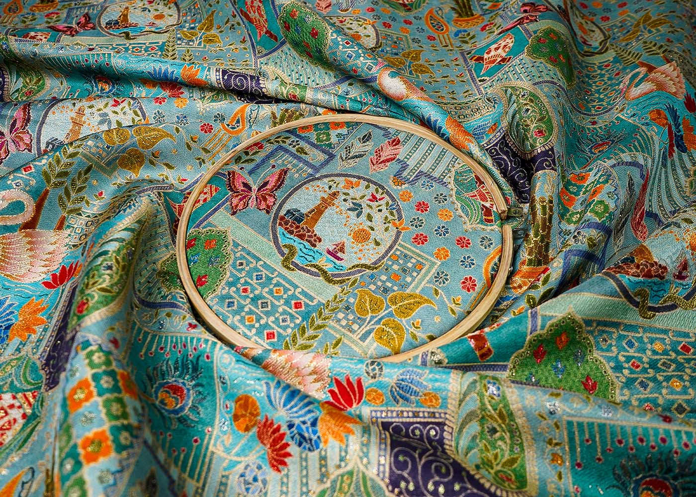Powder Blue Tissue Fabric With All Over Traditional Print With Zari Handloom 16462