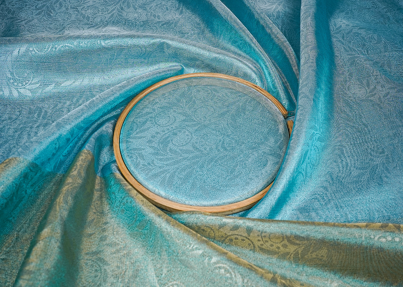 Sky Blue Tissue Fabric With All Over Traditional Self Work 16486