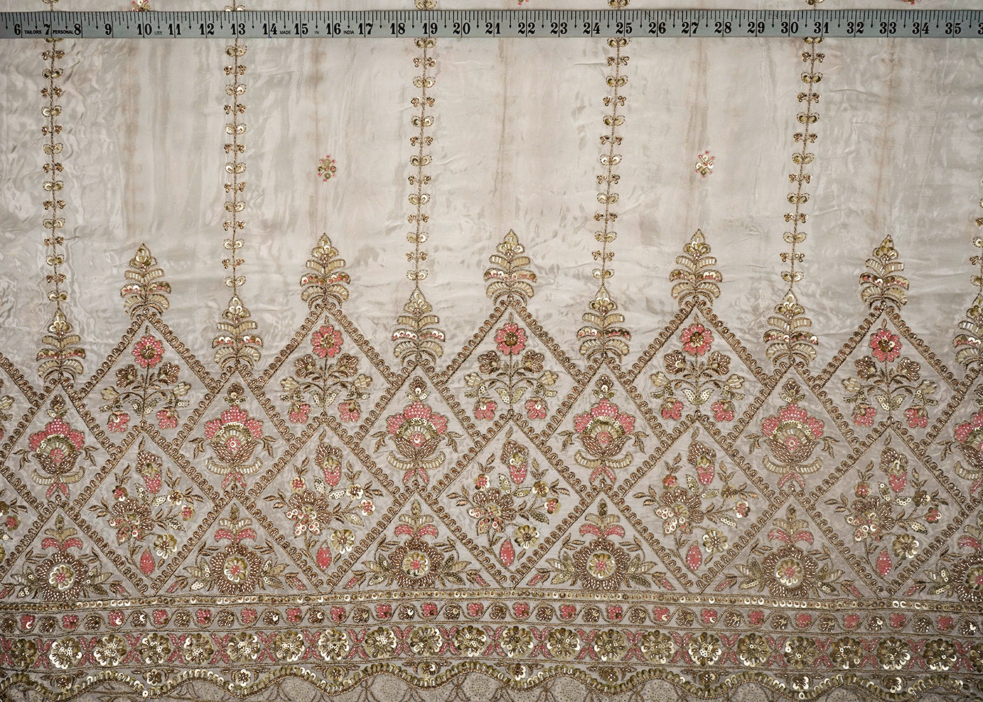 White Dyeable Crepe Fabric With All Over Sequins, Katdana And Zari Work With One Side Heavy Border 16622