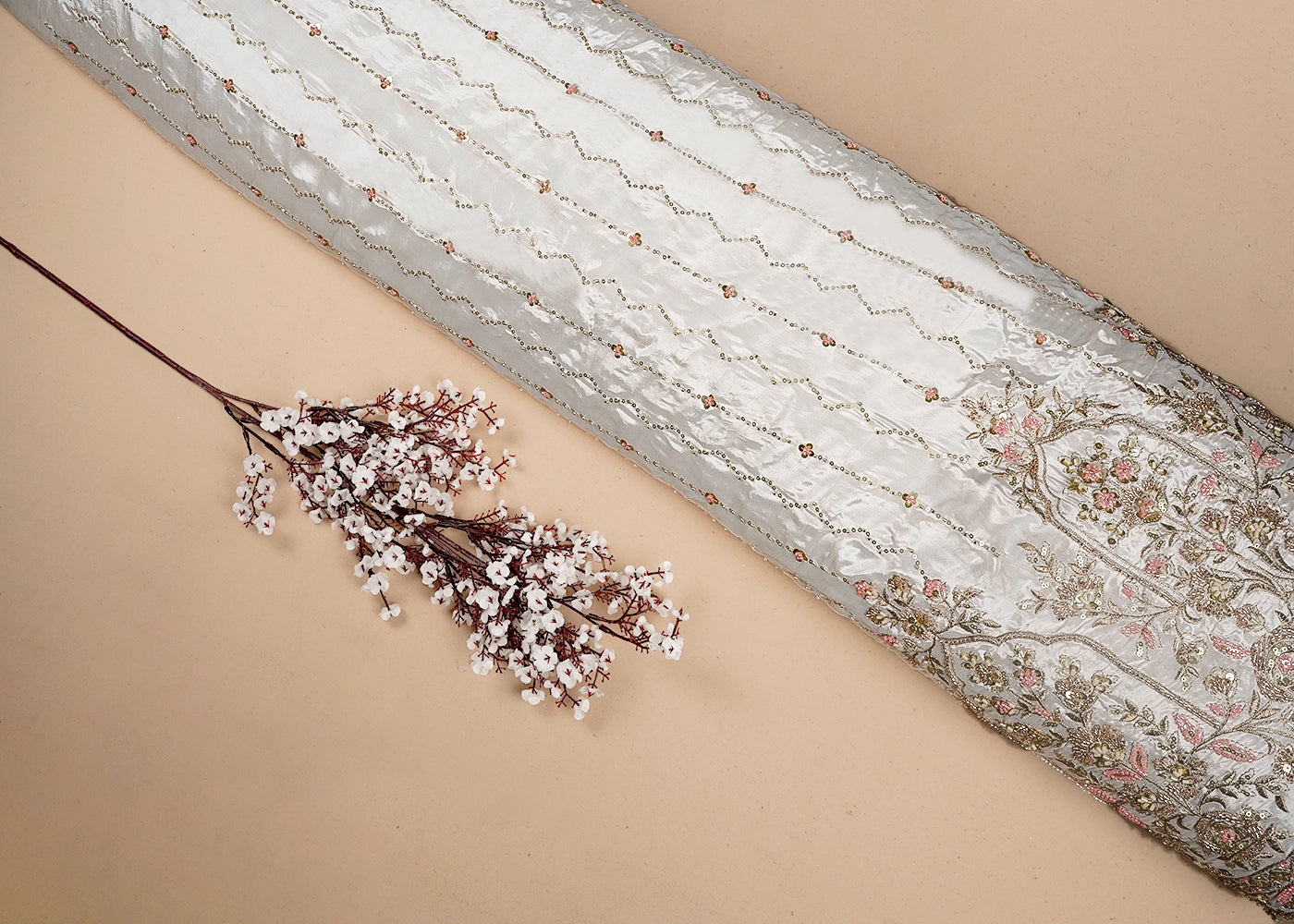 White Dyeable Crepe Fabric With All Over Sequins, Bead And Zari Work With One Side Heavy Border 16623