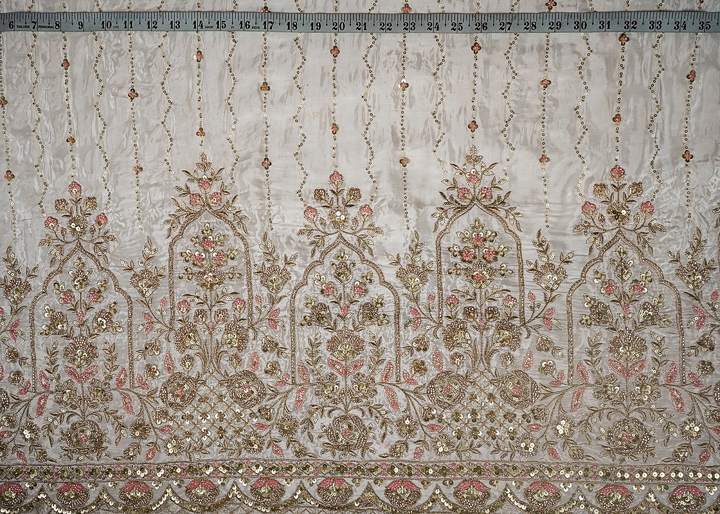 White Dyeable Crepe Fabric With All Over Sequins, Bead And Zari Work With One Side Heavy Border 16623