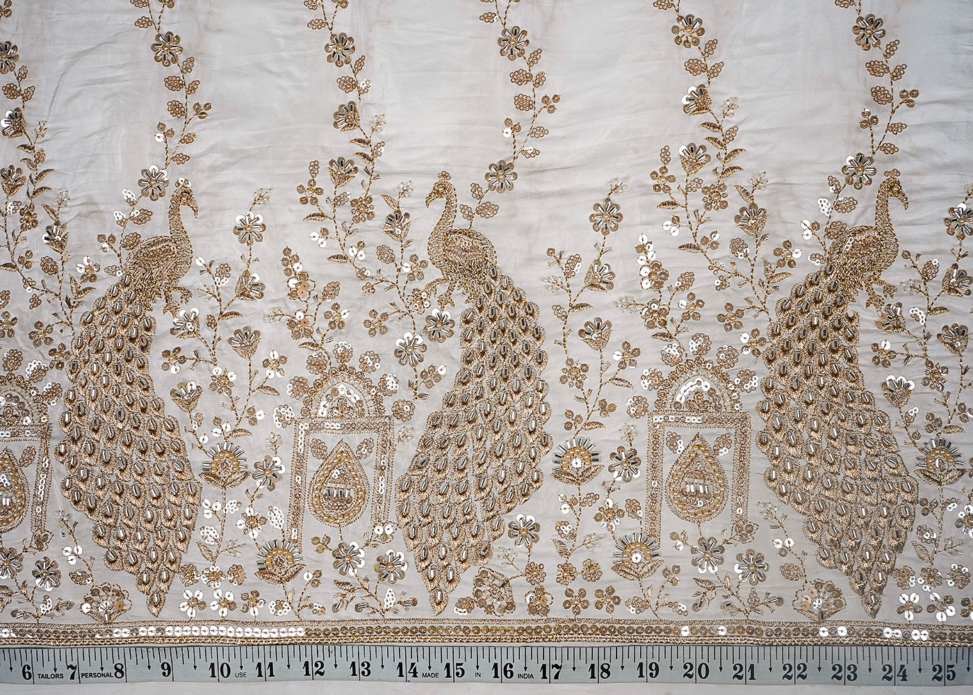 White Dyeable Crepe Fabric With All Over Sequins, Katdana And Zari Work With One Side Heavy Border 16625