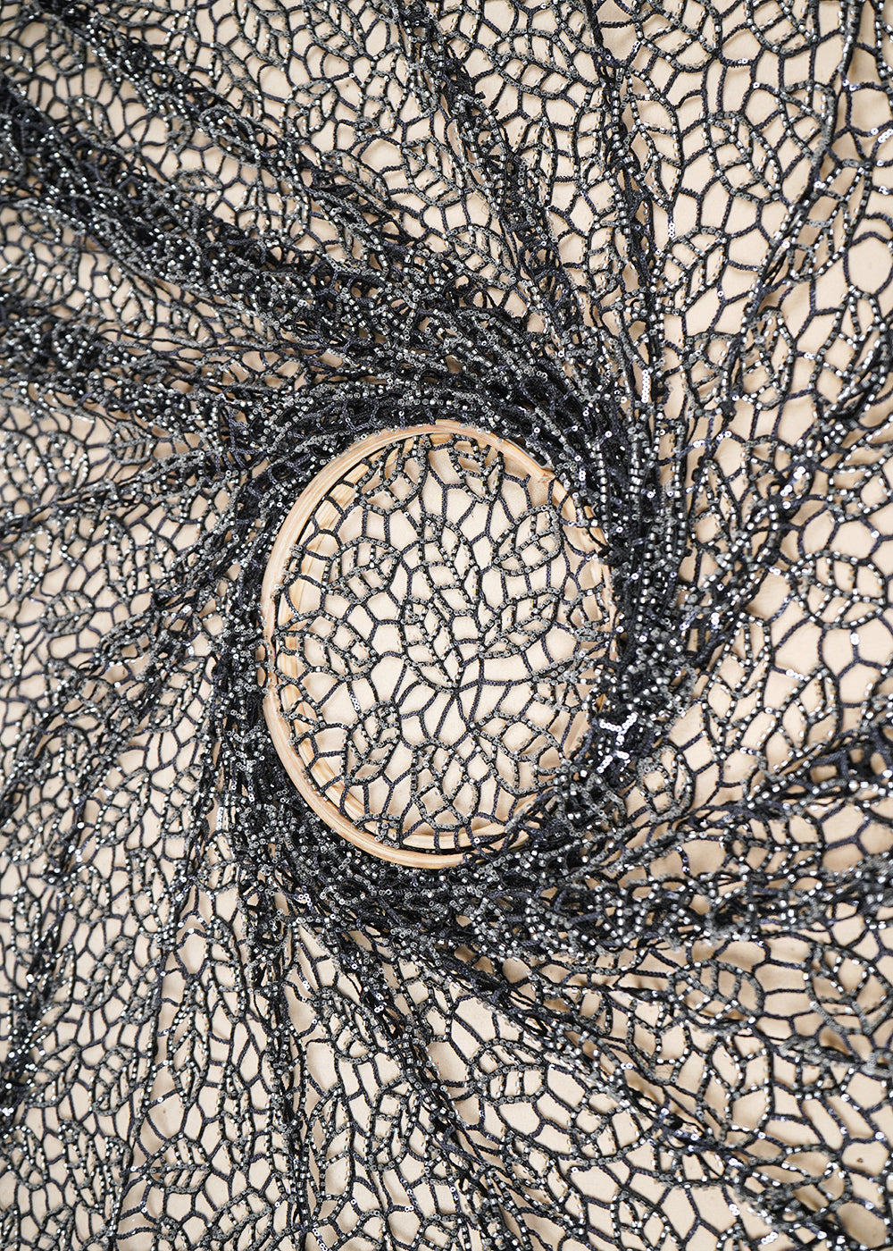 Black-Imported-Net-Fabric-With-All-Over-Cutwork-16747-close-view