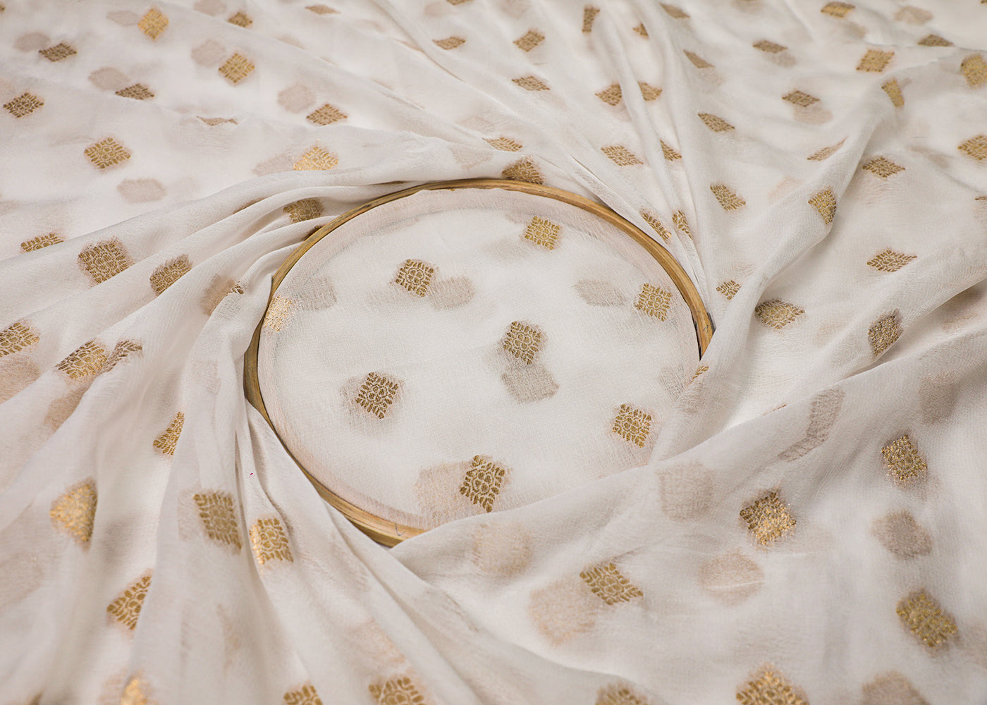 White Georgette Fabric With All Over Zari Handloom 16752