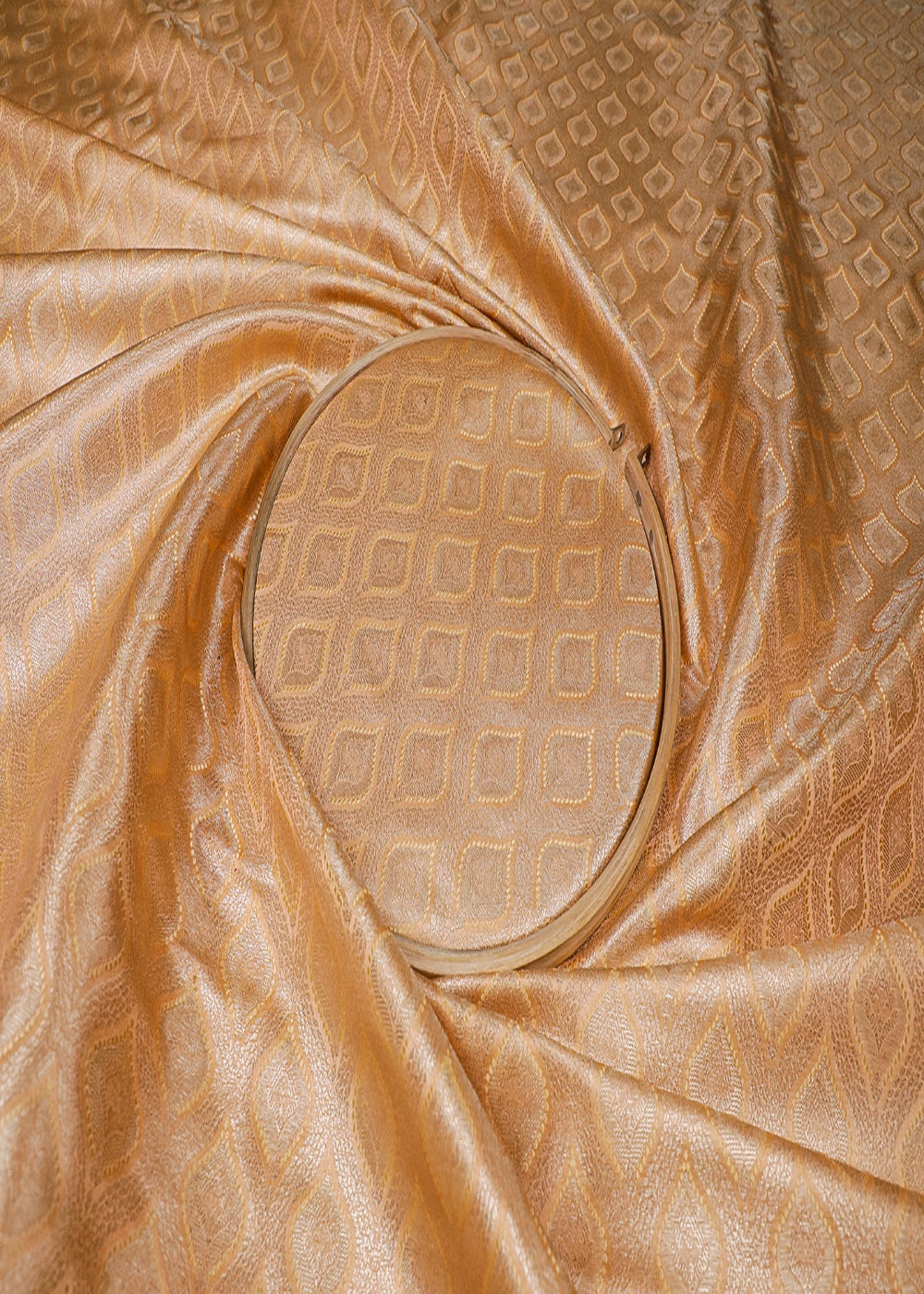 peach-banarasi-brocade-fabric-with-all-over-golden-zari-and-thread-handloom-16786-close-view