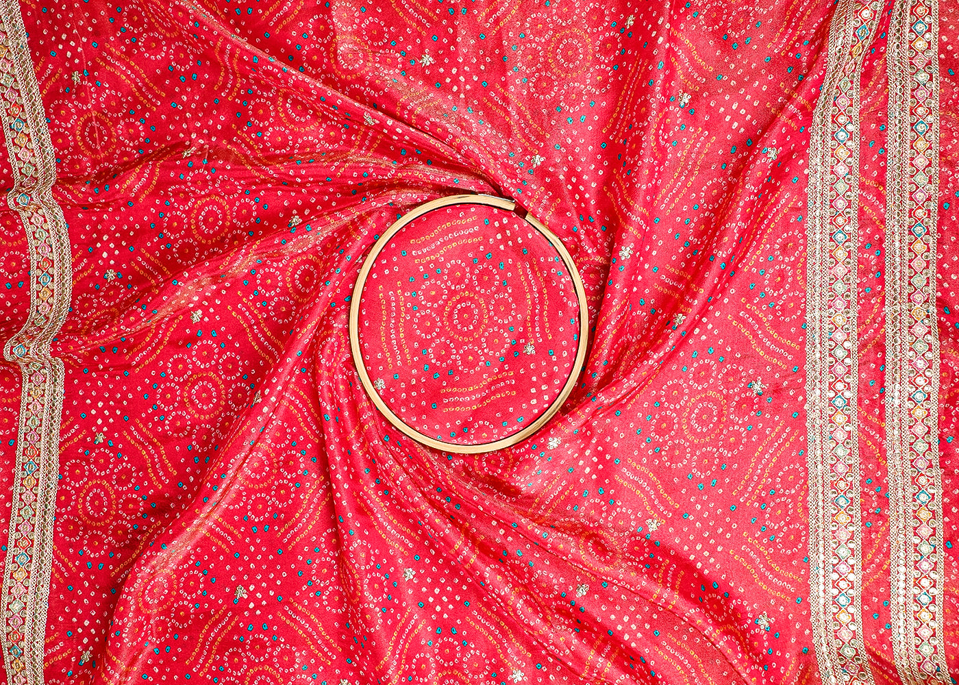 Purple Tissue Fabric With All Over Bandhani Print, Thread, Sequins And Zari Work With One Side Border 16794