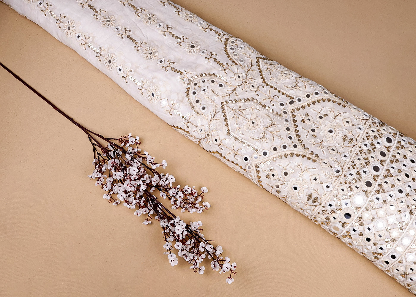 White Georgette Fabric With All Over Zari, Thread, Faux Mirror, Sequins And One Side Heavy Border 16867