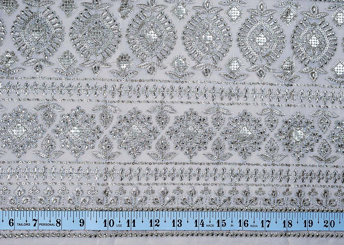 ( Pre-Cut 2.6 MTR) White Georgette Fabric With All Over Zari Sequins And Gota Patti Work With One Side Heavy Border 17636