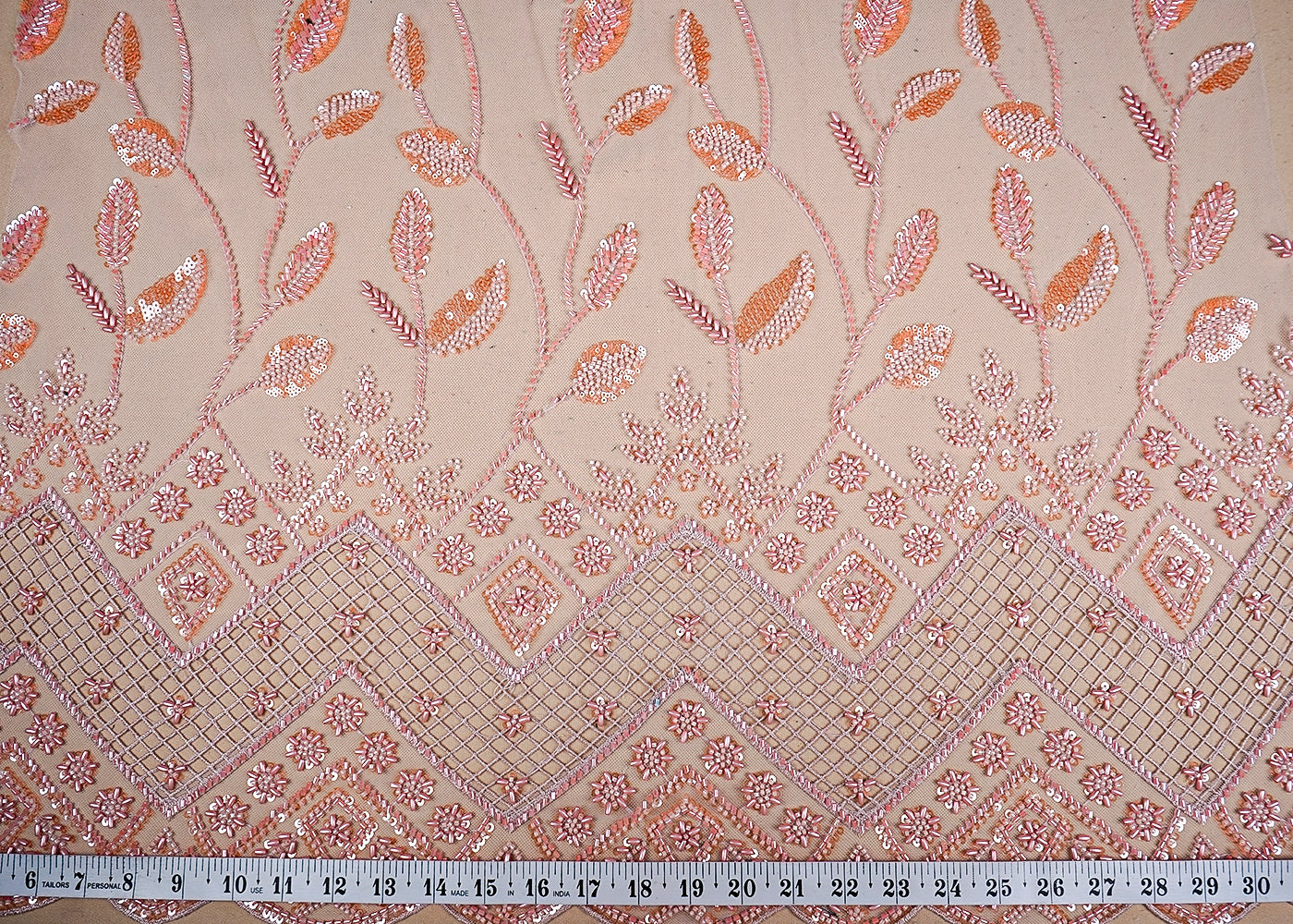 (Pre-Cut 0.7 MTR) Peach Imported Net Fabric With All Over Bead Katdana And Sequins Work With One Side Cutwork Border  18415