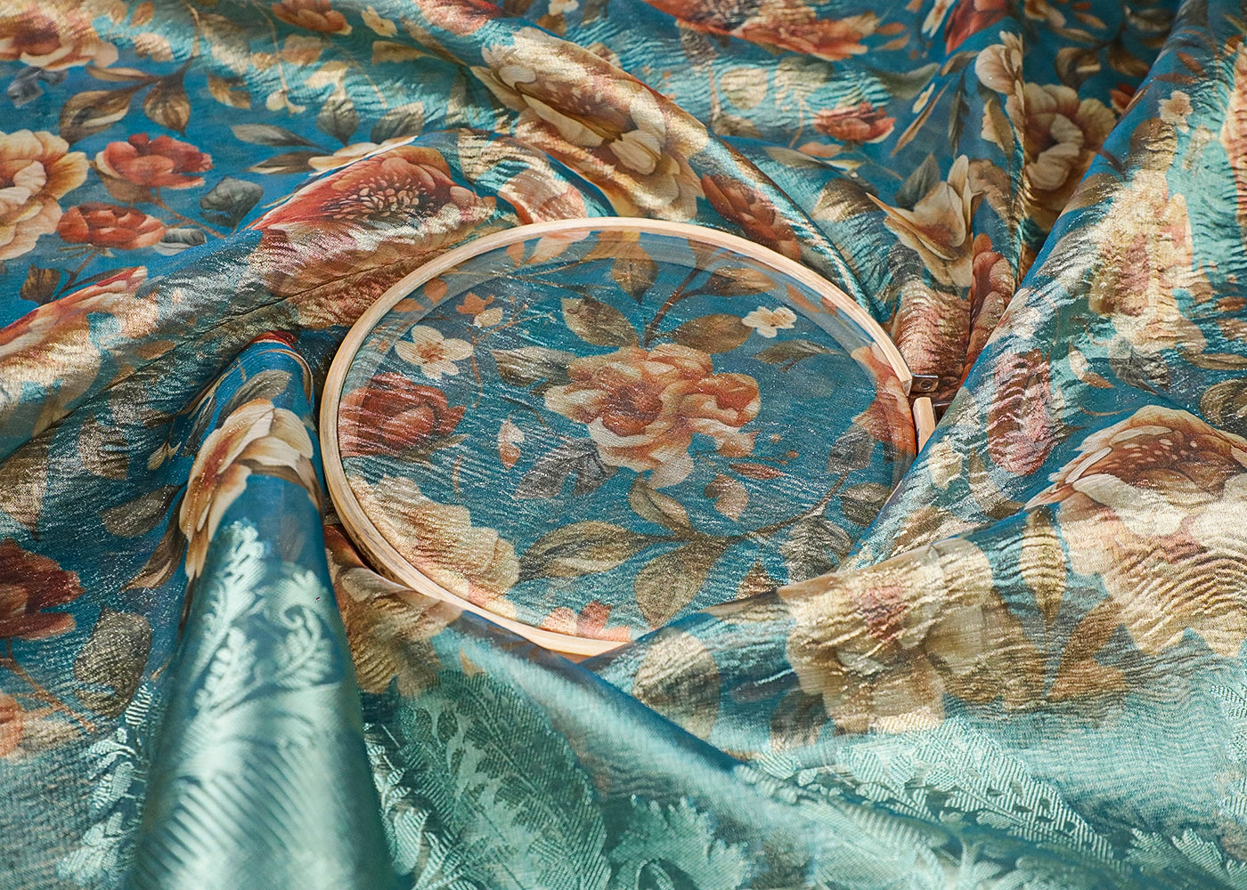 Sea Blue Organza Fabric With All Over Floral Print And Thread Handloom Border 19144