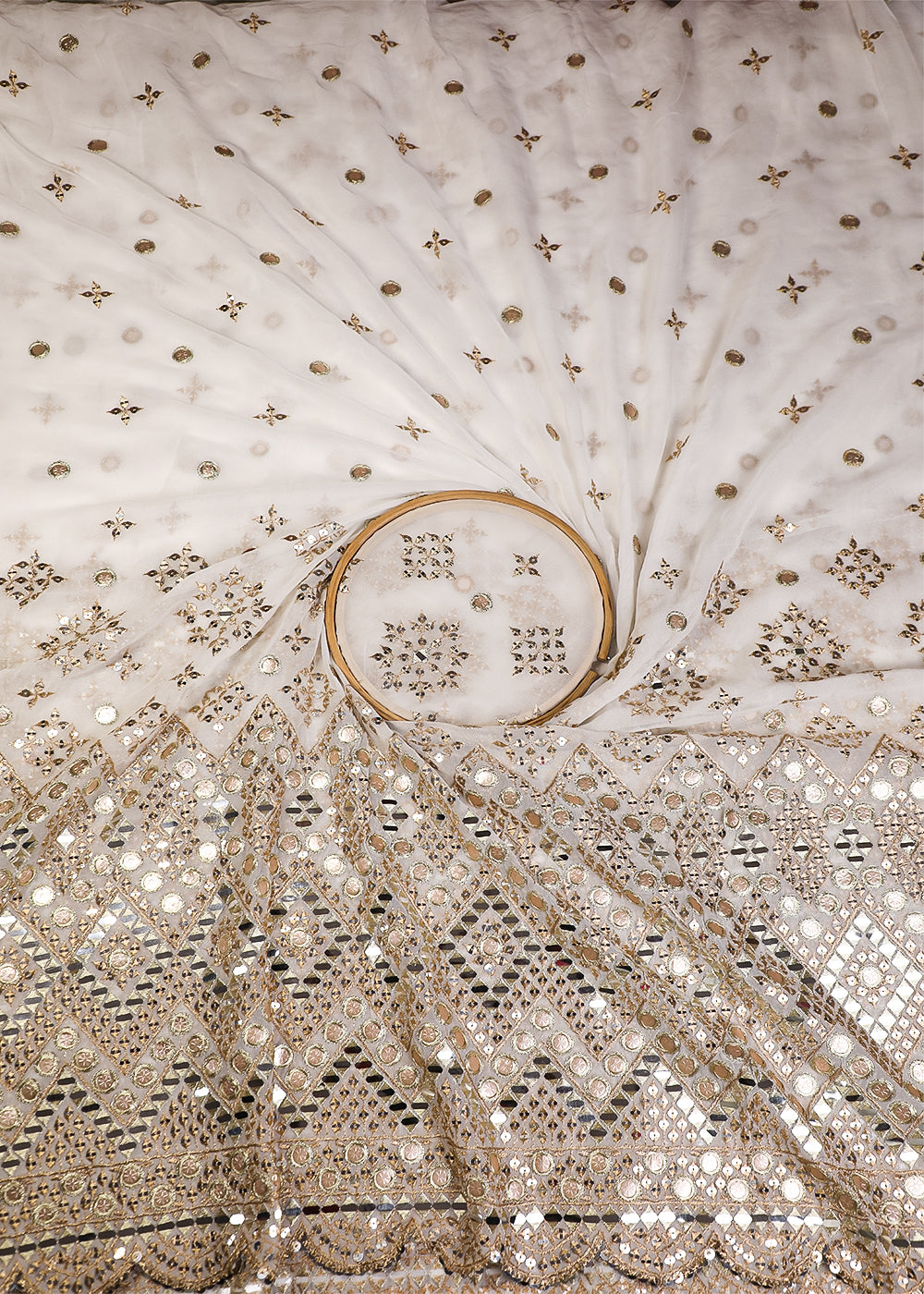 White Georgette Fabric With All Over Zari, Sequins And Faux Mirror Work With One Side Border 19160