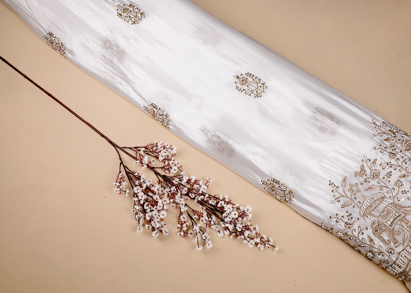 White Crepe Fabric With All Over Zari, Bead, Katdana And Sequins Work With One Side Elephant Motif Border 19183