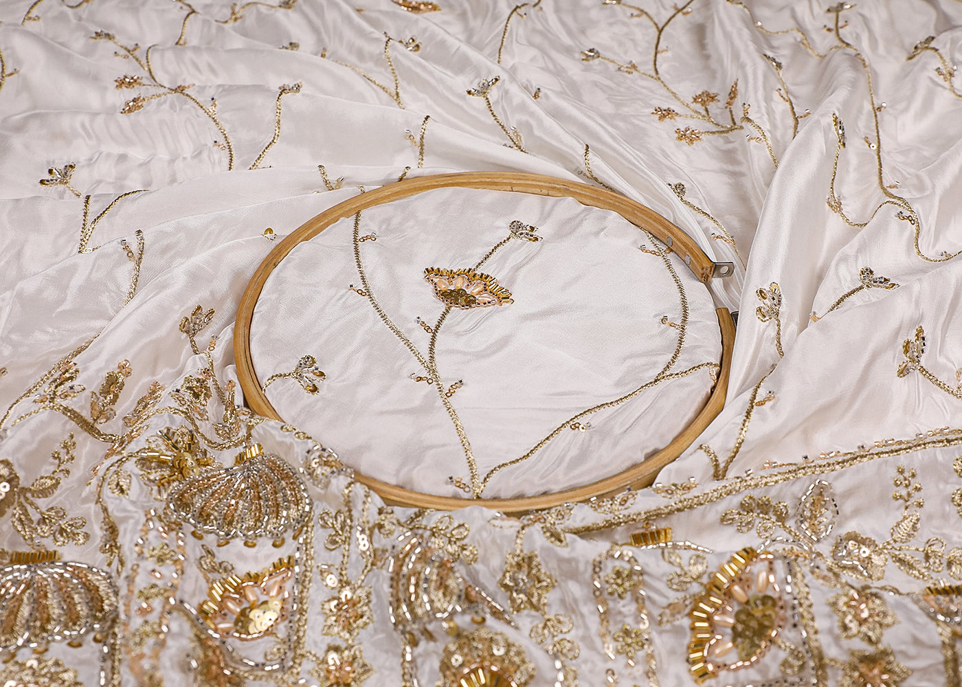 White Crepe Fabric With All Over Bead, Zari, Sequins Work And One Side Heavy Border 19593