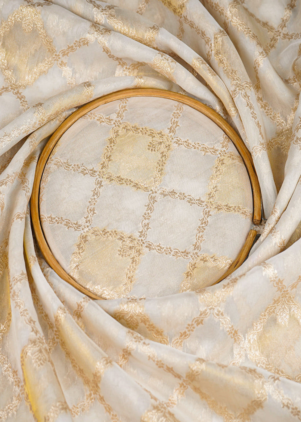 White-Organza-Tissue-Fabric-with-Allover-Golden-Zari-Jaal-Pattern-Handloom-19621-close-view
