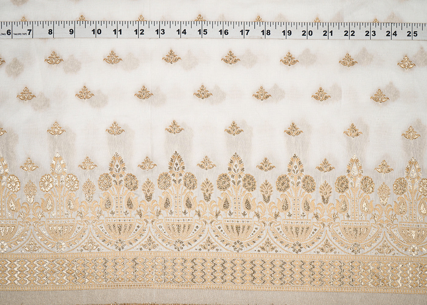 White Upada Silk Fabric with Allover Zari Handloom and One-Side Border 19703