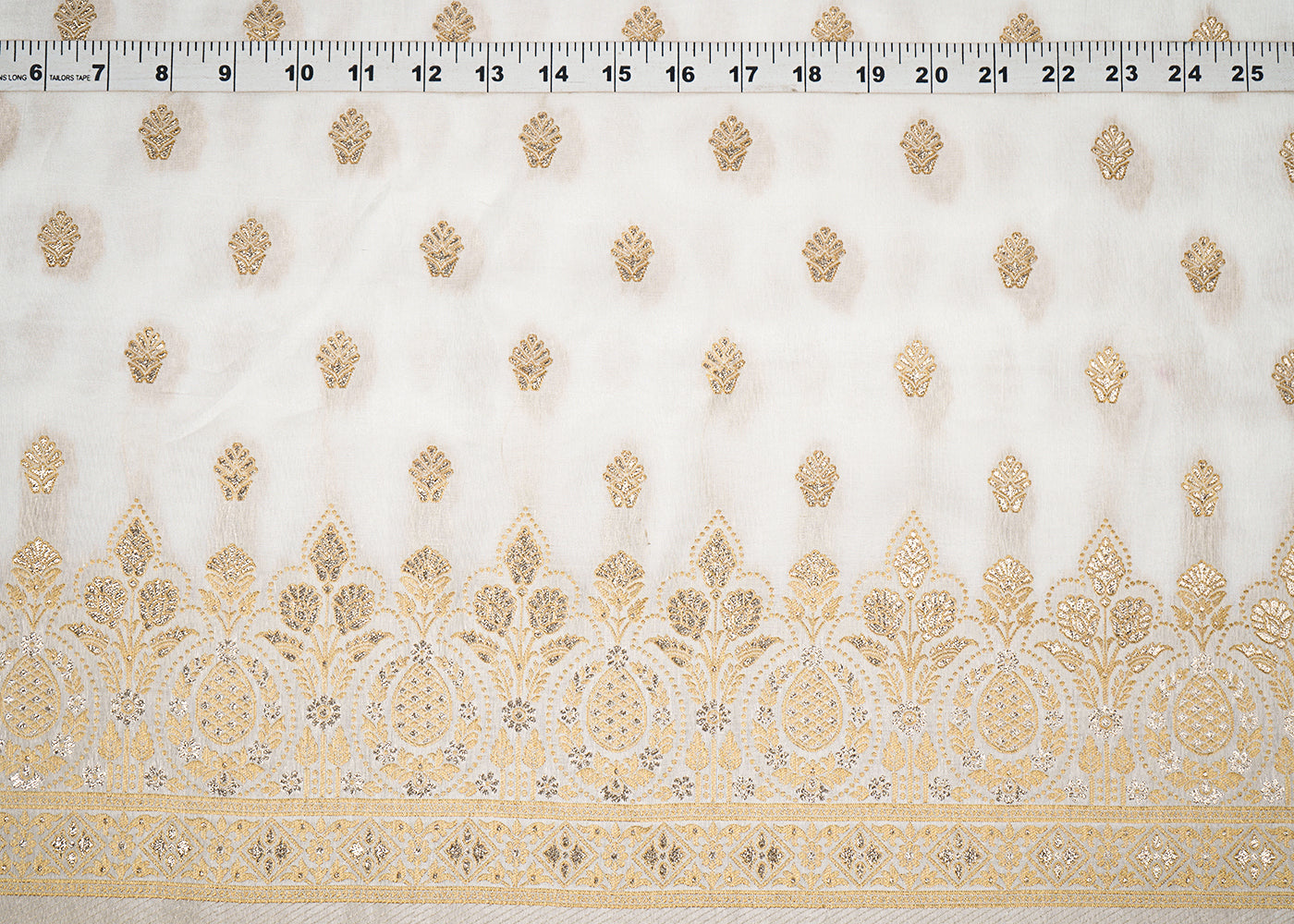 White Upada Silk Fabric with Allover Zari Handloom and One-Side Border 19704