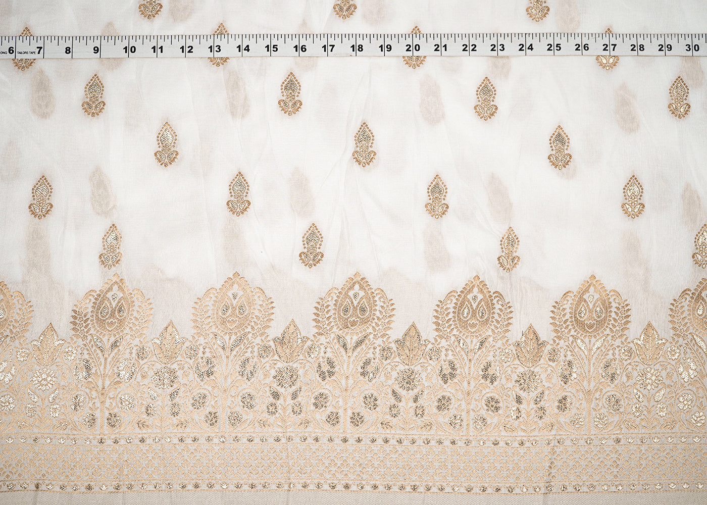 White Upada Silk Fabric with Allover Zari Handloom and One-Side Border 19705