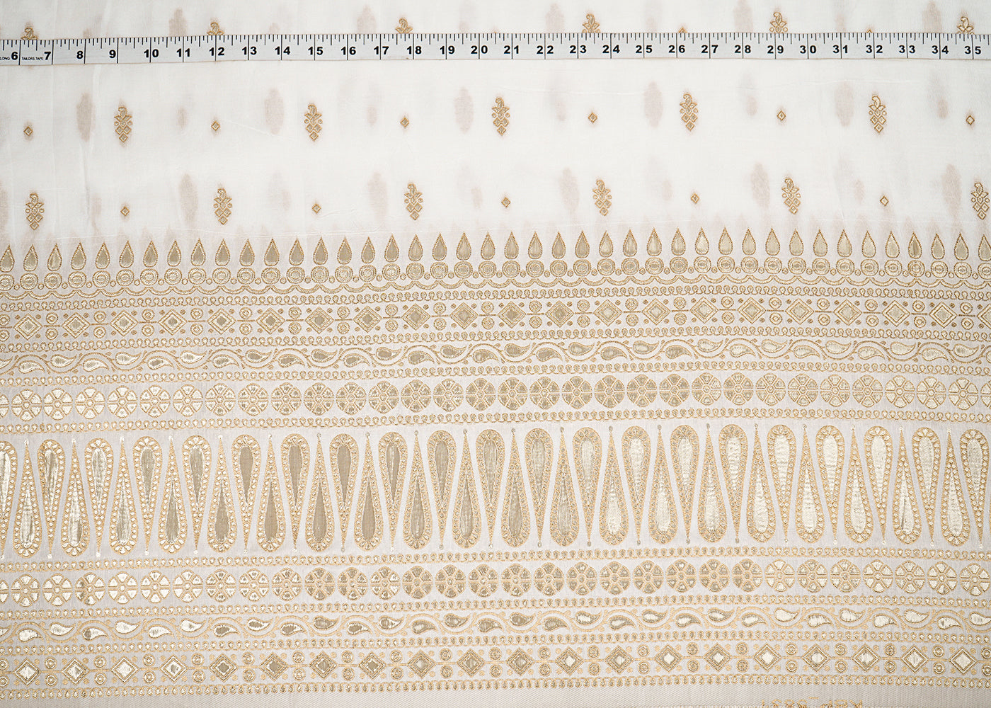 White Upada Silk Fabric with Allover Zari Handloom and One-Side Border 19706