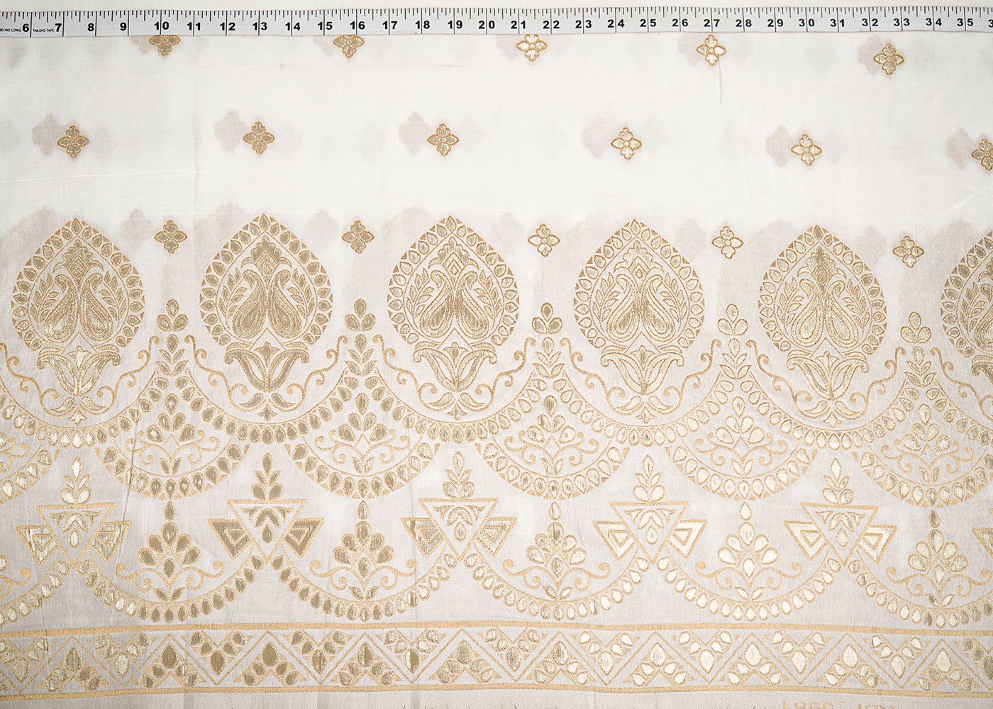 White Upada Silk Fabric with Allover Zari Handloom and One-Side Border 19707